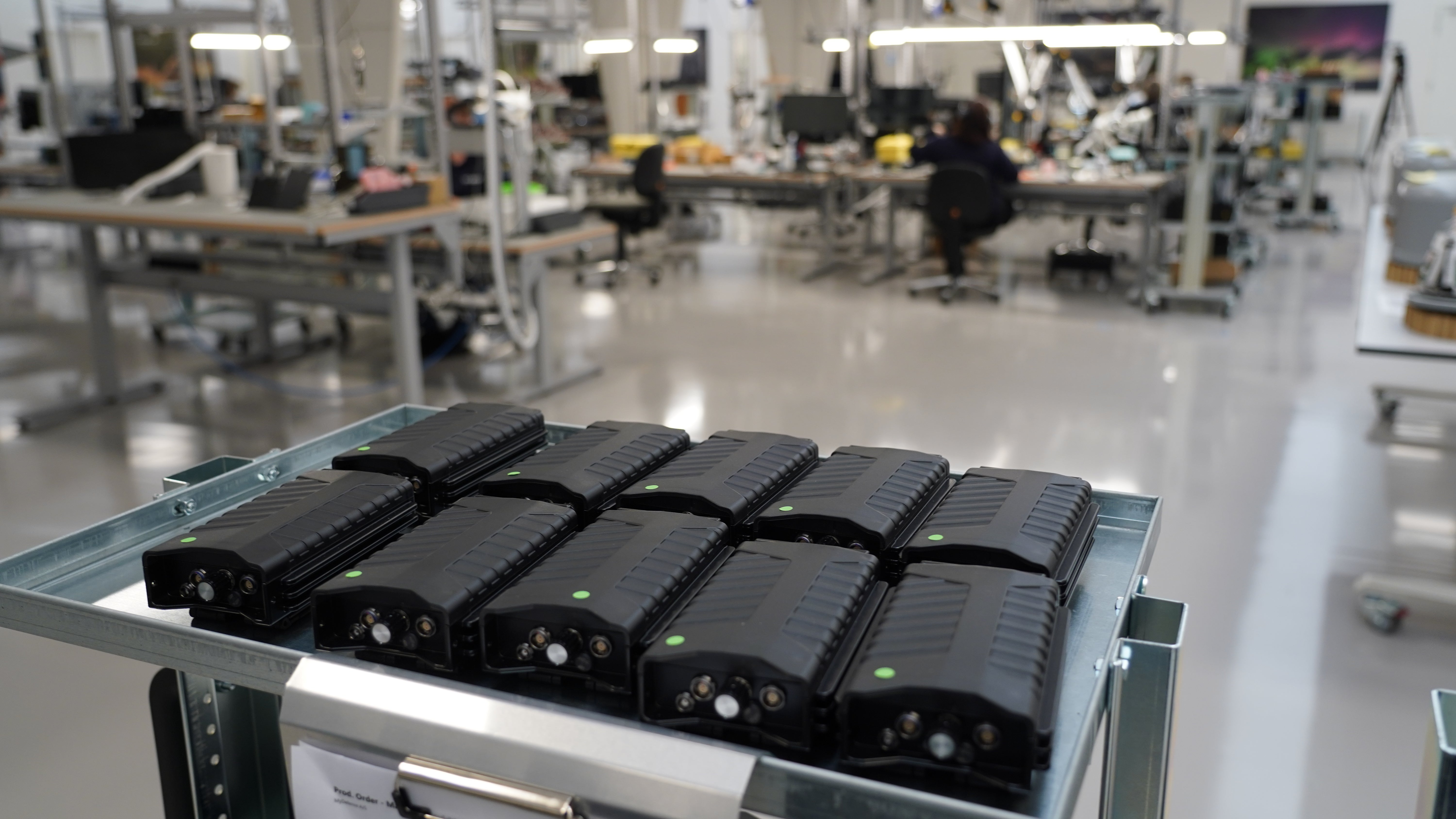 Assembled counter drone devices sit on a try at MyDefence's headquarters in Alborg, Denmark