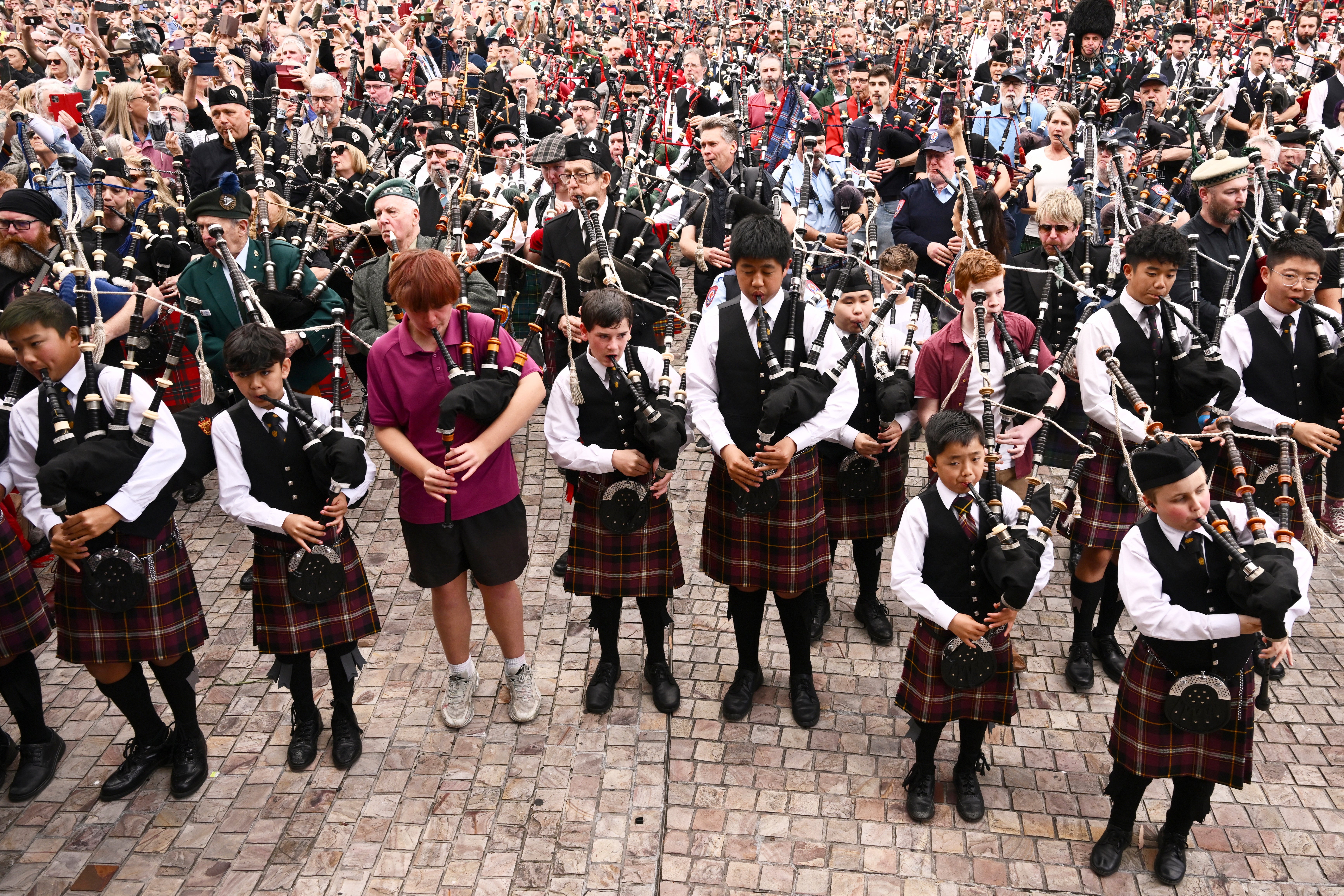 Bagpipers gather to break a world record playing AC/DCs It's a Long Way to the Top