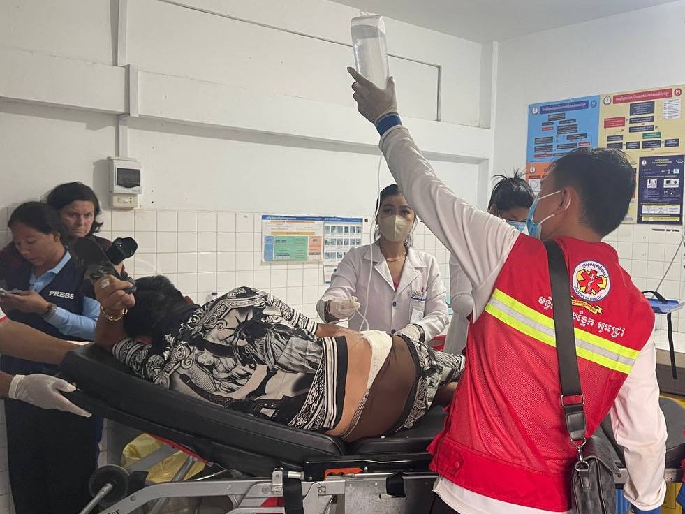 An injured man is treated in a local hospital after Thai soldiers opened fire in Prey Chan village, Banteay Meanchey province, Cambodia