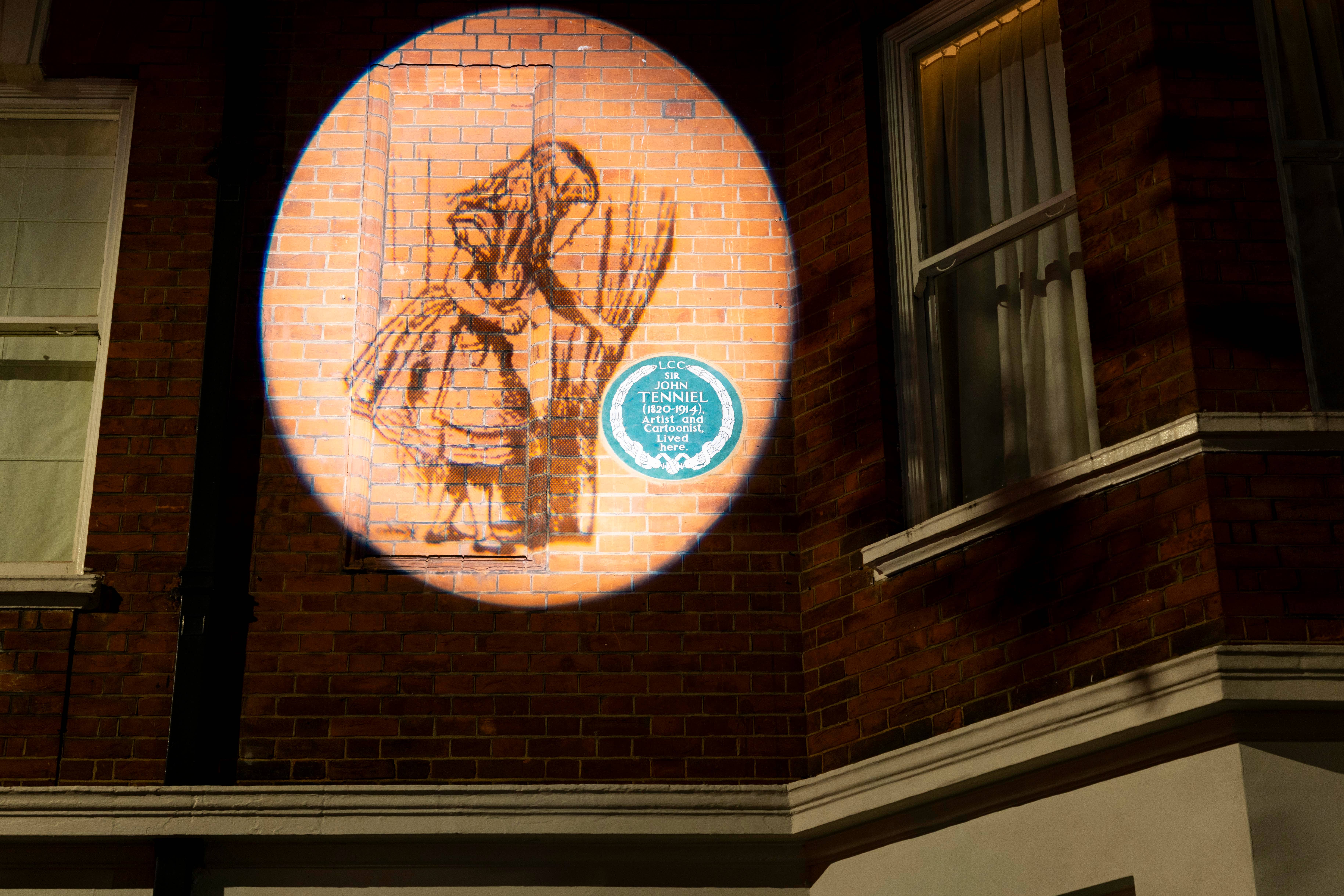 The plaque honouring Alice In Wonderland illustrator Sir John Tenniel has been reinstalled (David Parry/PA)