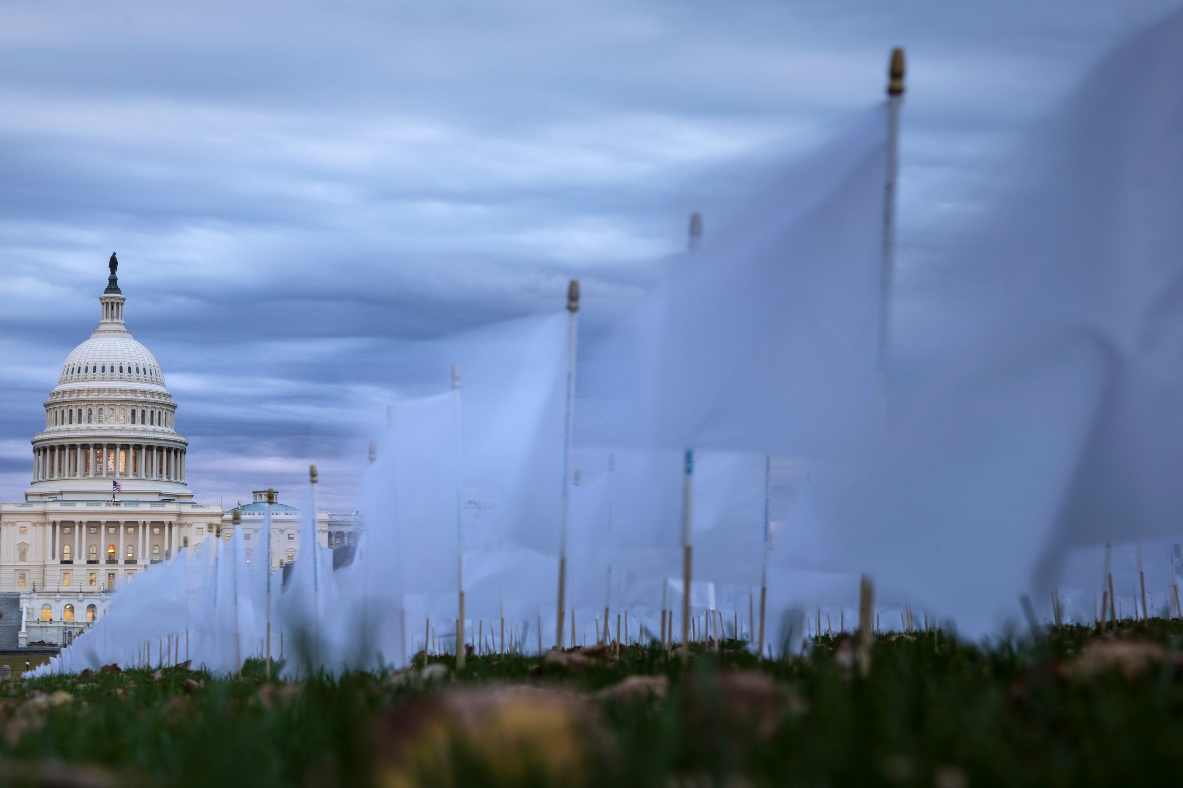 White flags are planted to commemorate lung cancer victims in Washington, D.C., Tuesday. Approximately 226,650 new cases and 124,730 deaths are expected across the U.S. this year