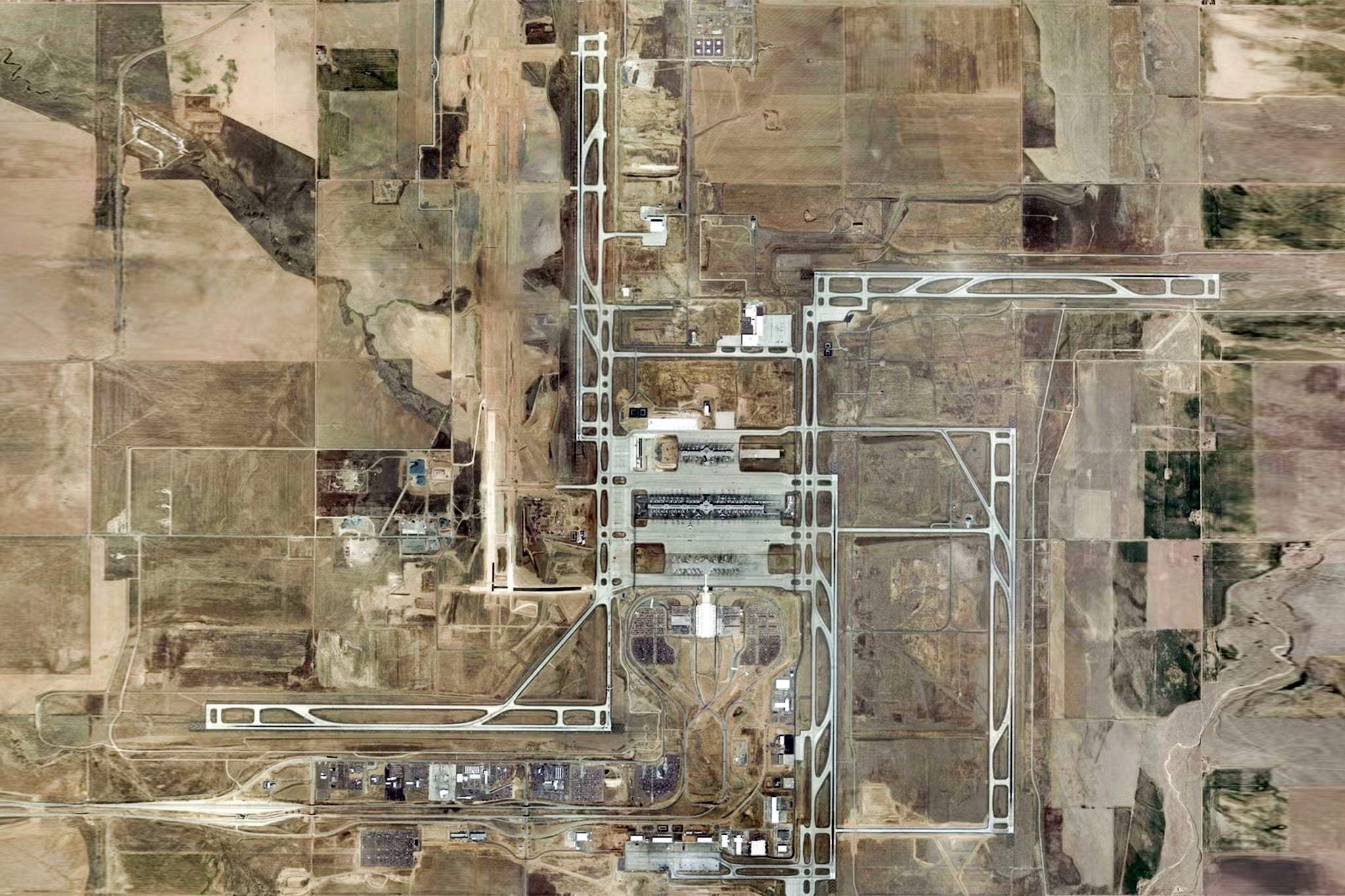 Aerial photos show the runways’ pinwheel design, but aviation engineers have said that it’s simply a practical layout that allows multiple planes to land in varying wind conditions