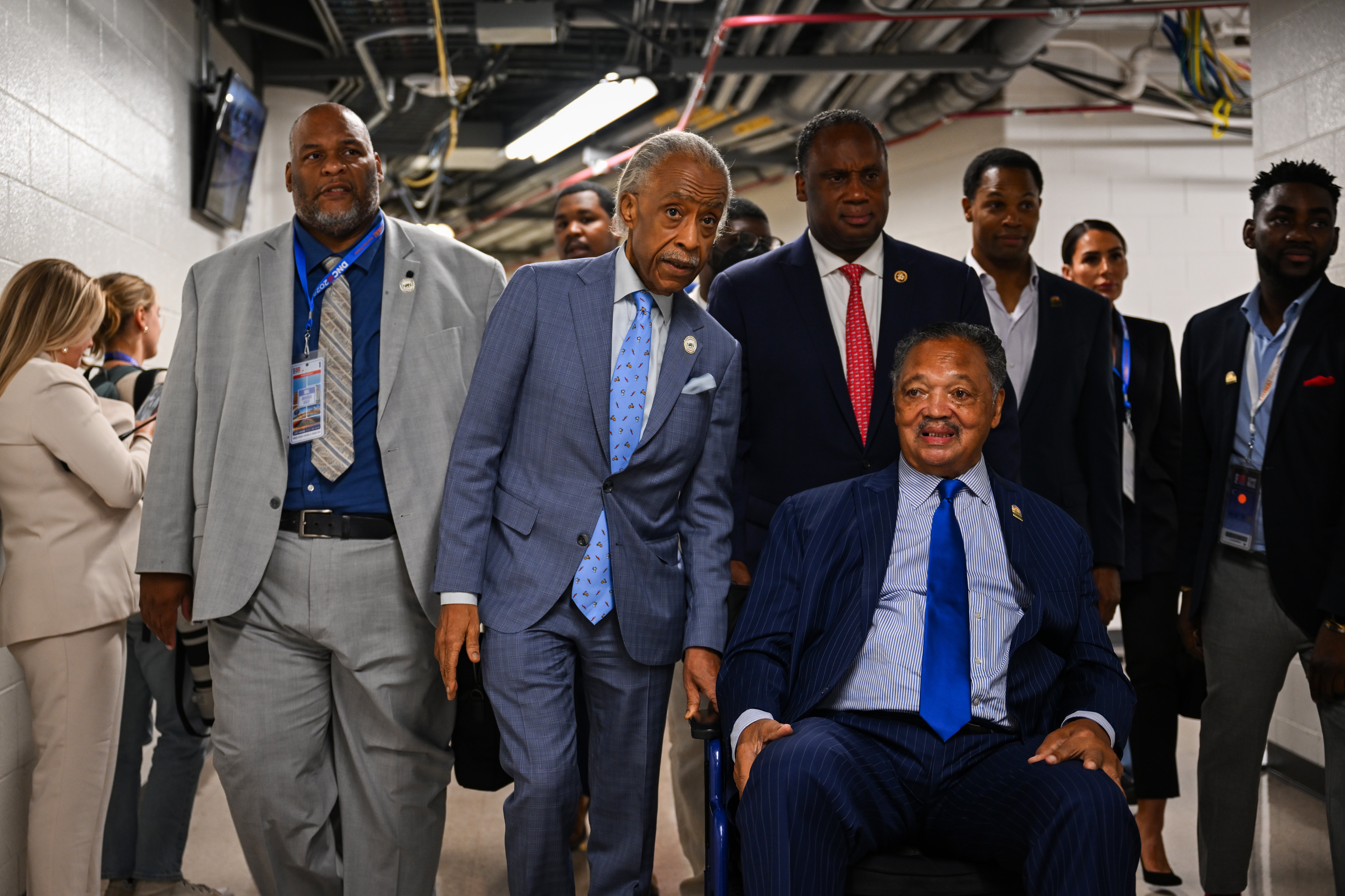 Jackson (center) appeared at the Democratic National Convention alongside his mentee Rev. Al Sharpton (left) in August 2024