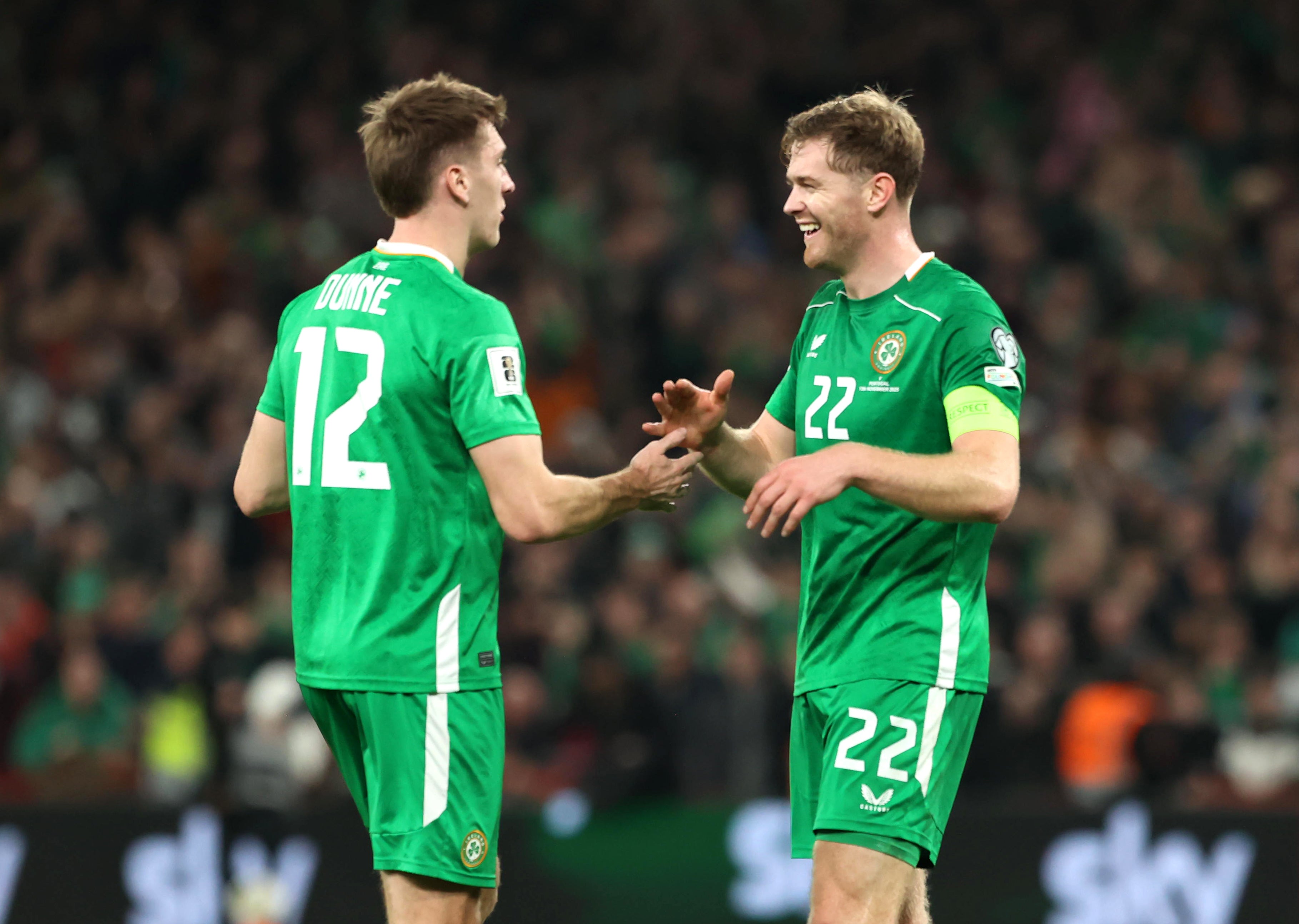 Republic of Ireland’s James Dunne and Nathan Collins celebrate at the end of the game (Liam McBurney/PA)