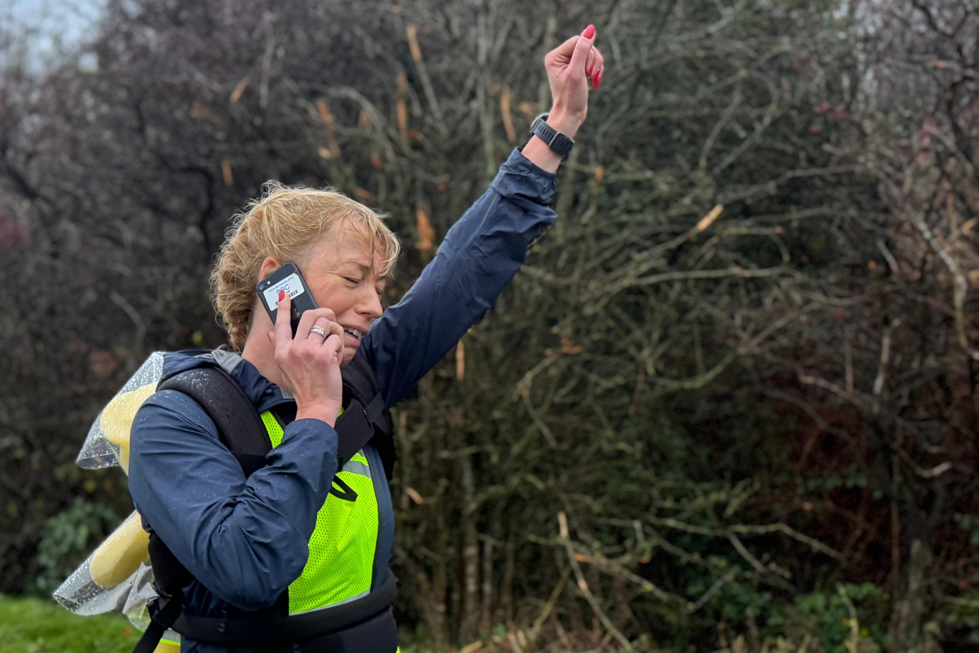 Sara Cox receiving a message from the Prince of Wales during her Children In Need challenge