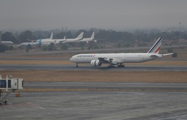 <p>An Air France plane lands at the International O.R. Tambo Airport in Johannesburg, Oct. 1, 2020. (AP Photo/Themba Hadebe, File)</p>