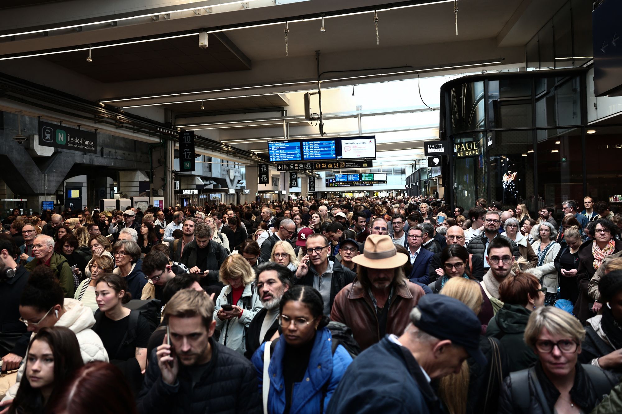 Passengers wait inside the Montparnasse train station in Paris on Friday after the incident