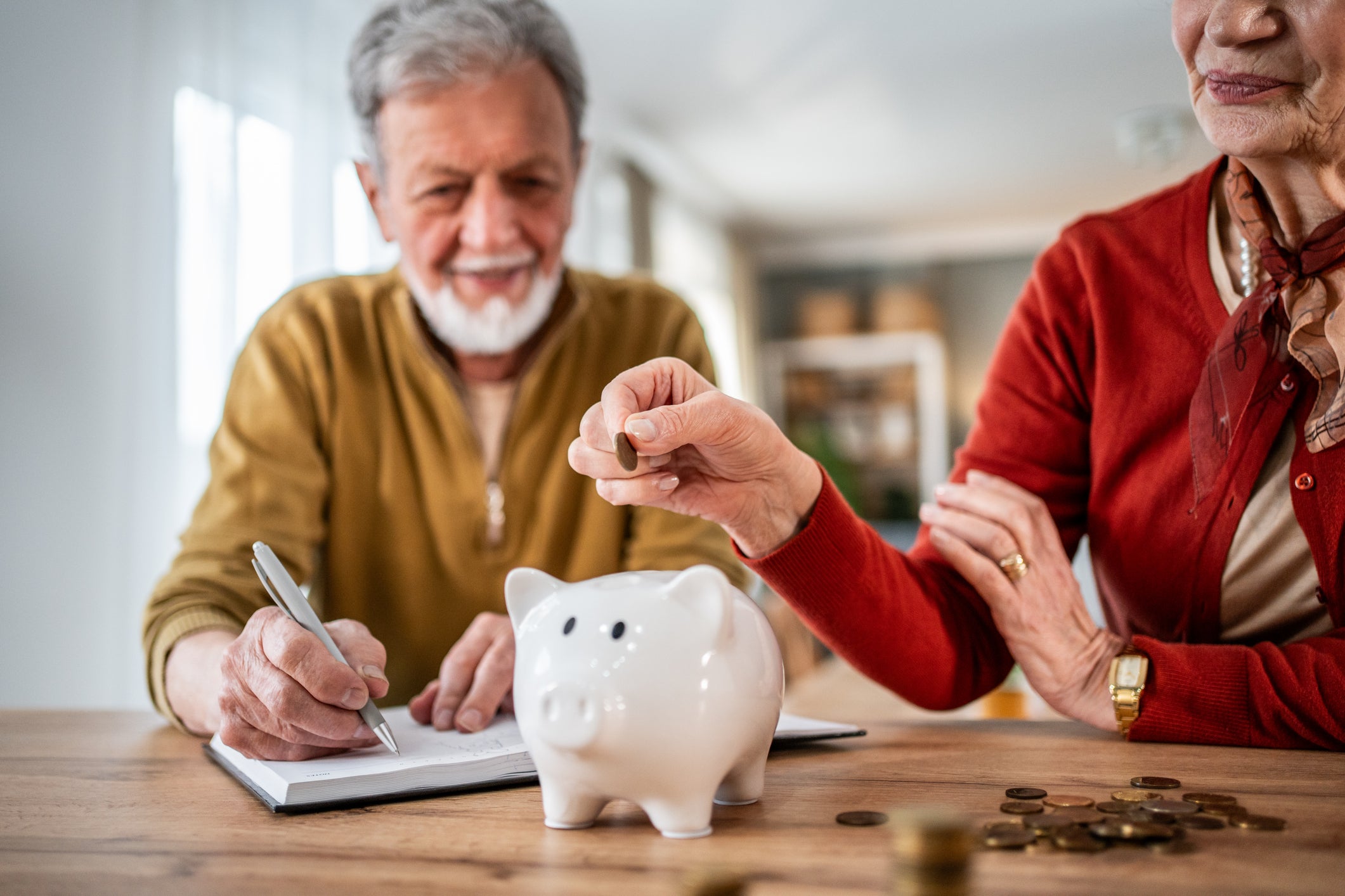 Paying off high-interest debt, like credit card balances, is a sensible step in retirement, according to AARP