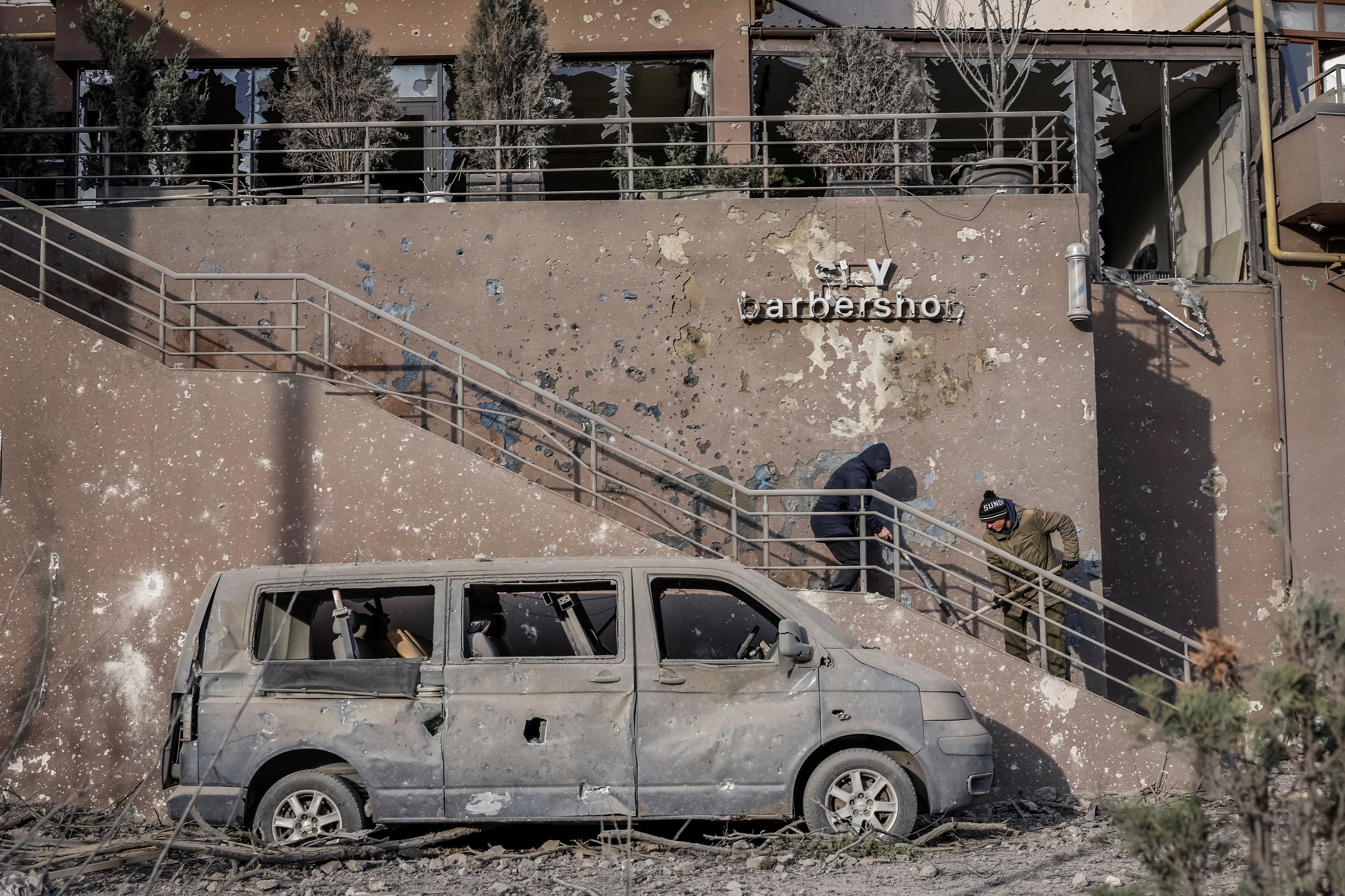 Eight of the capital's 10 districts reported damage. Emergency crews fought fires in apartment blocks, debris from explosions was strewn across yards and cars parked in the streets were set ablaze