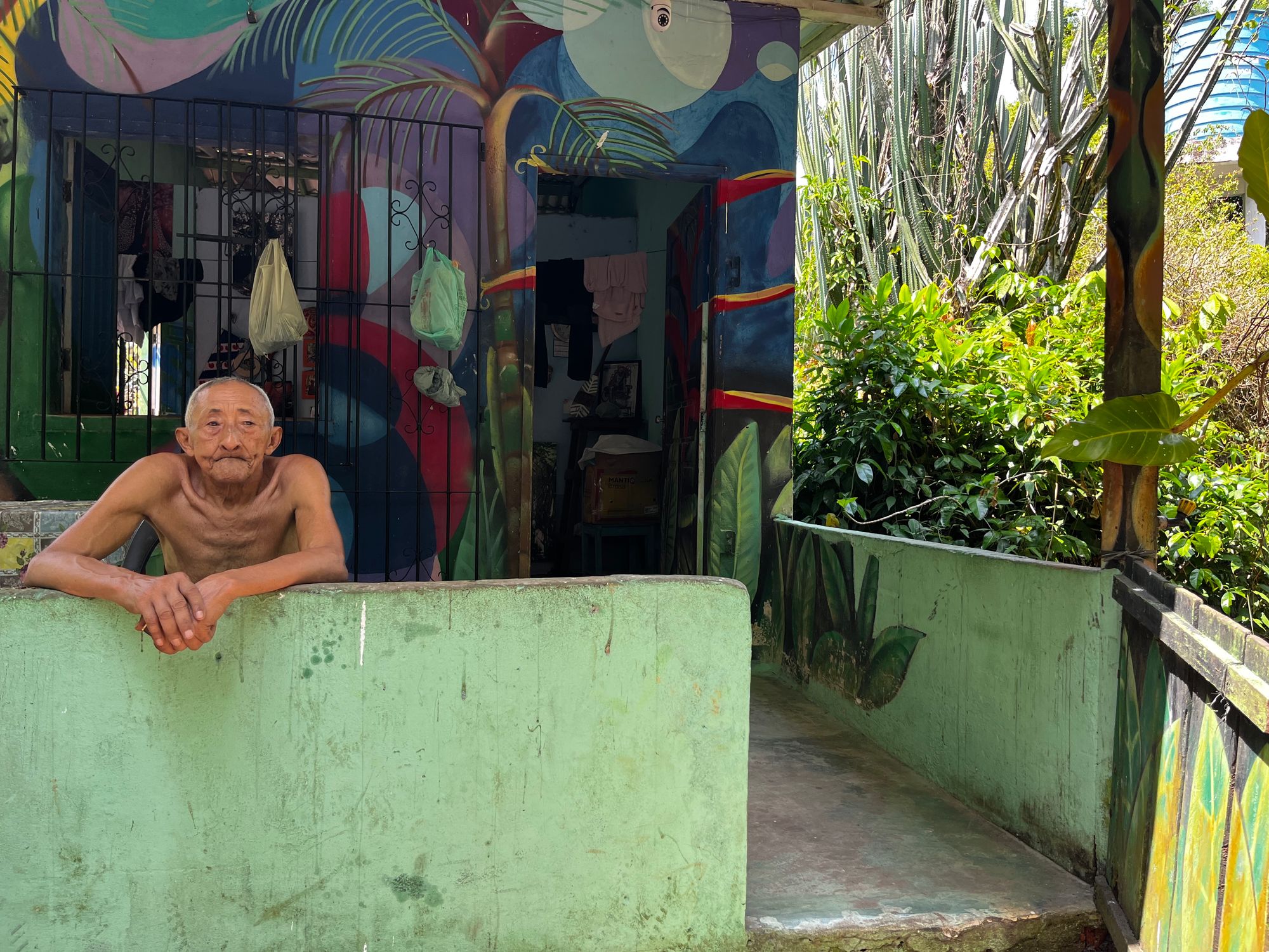 Seu Ladi at his home in the forest