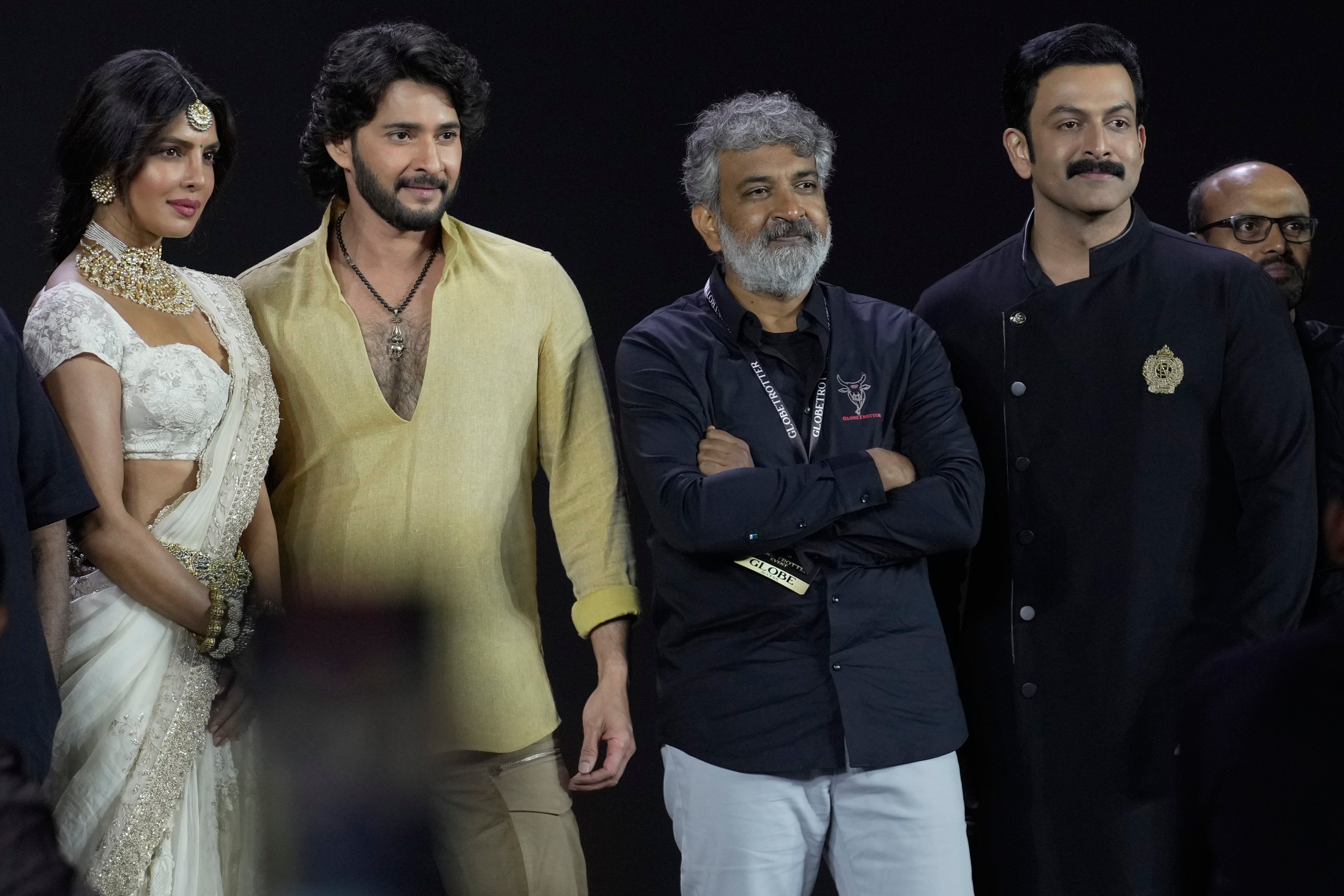 Filmmaker SS Rajamouli, third from left, with Telugu superstar Mahesh Babu, actress Priyanka Chopra Jonas and actor Prithviraj Sukumaran, extreme right, pose for photograph after unveiling of first look of film ‘Varanasi’