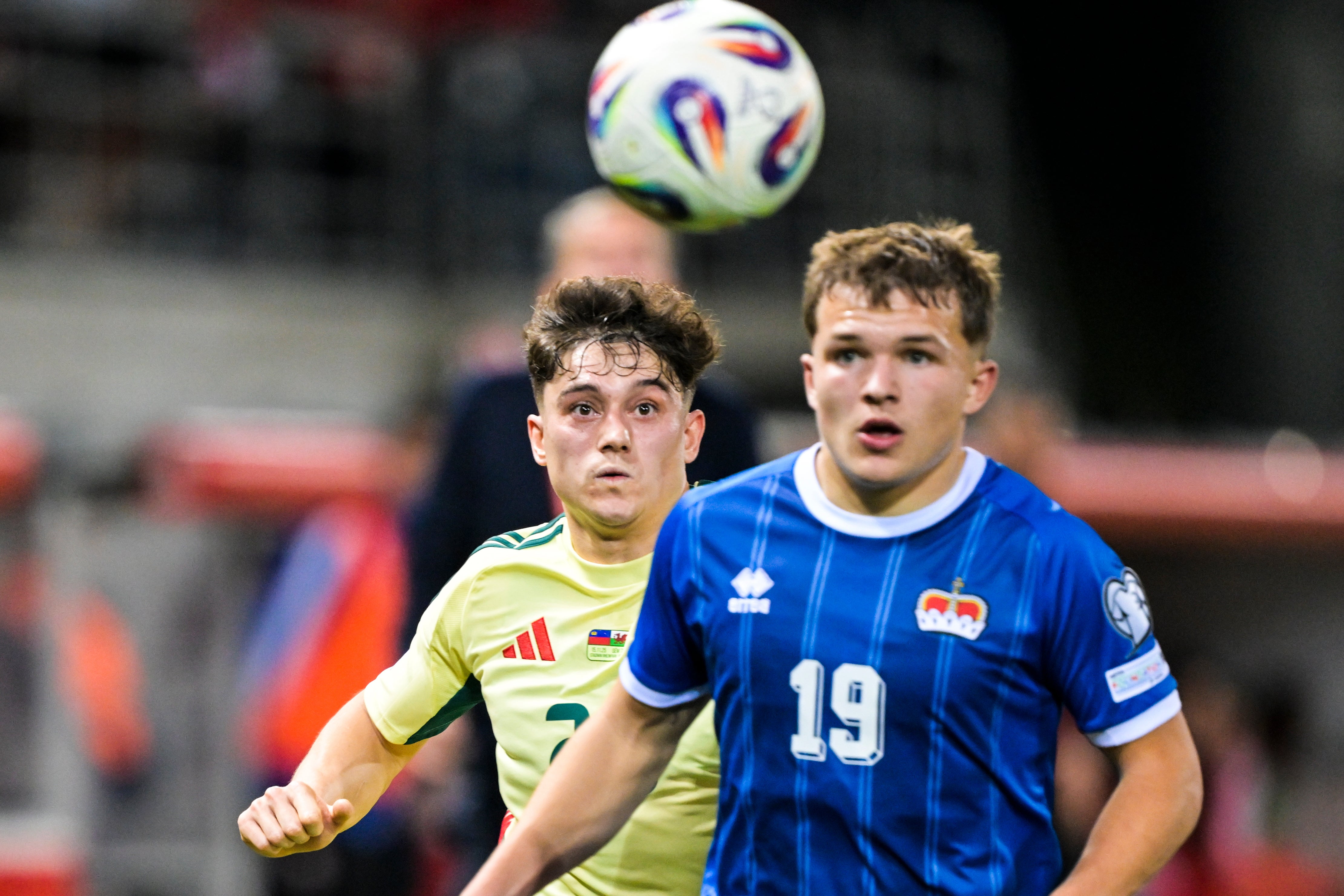 Wales winger Daniel James (left) and Liechtenstein’s Emanuel Zund fight for the ball (Gian Ehrenzeller/Keystone via AP)