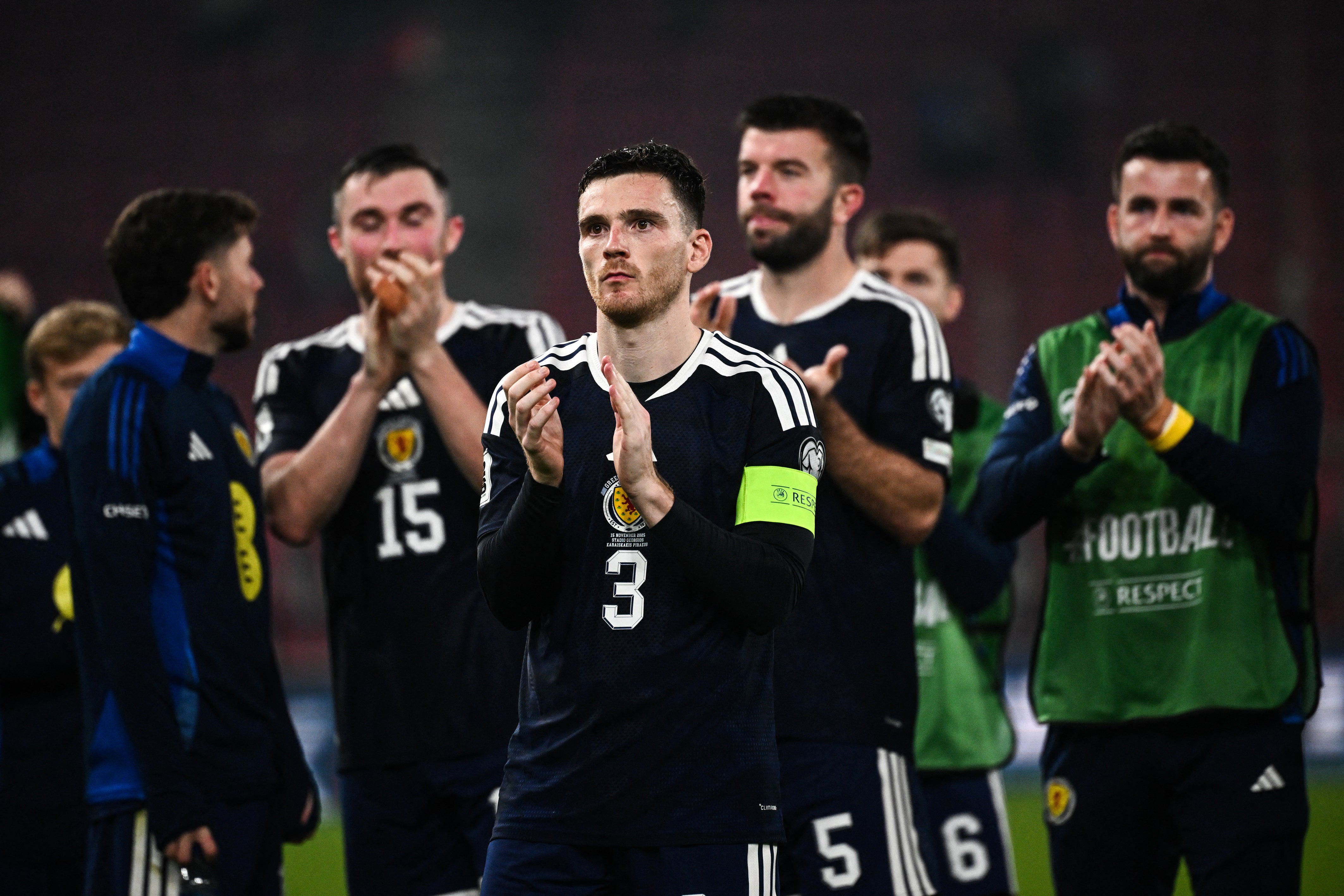 Captain Andy Robertson applauds the Scottish fans