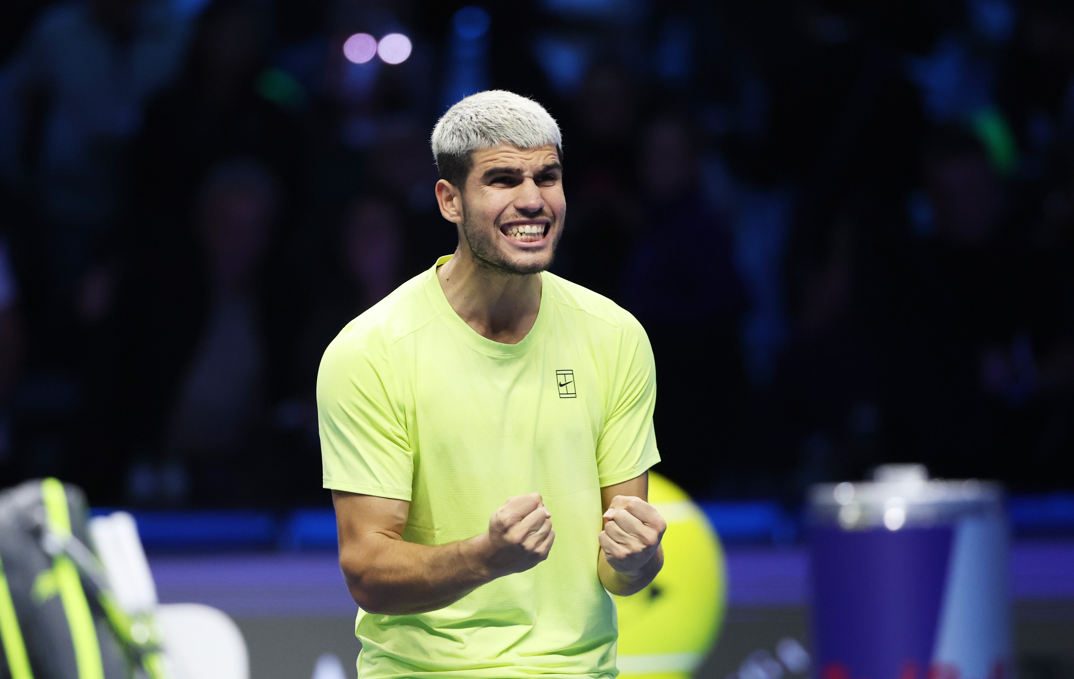 <p>Carlos Alcaraz celebrates after clinching his place in the final</p>