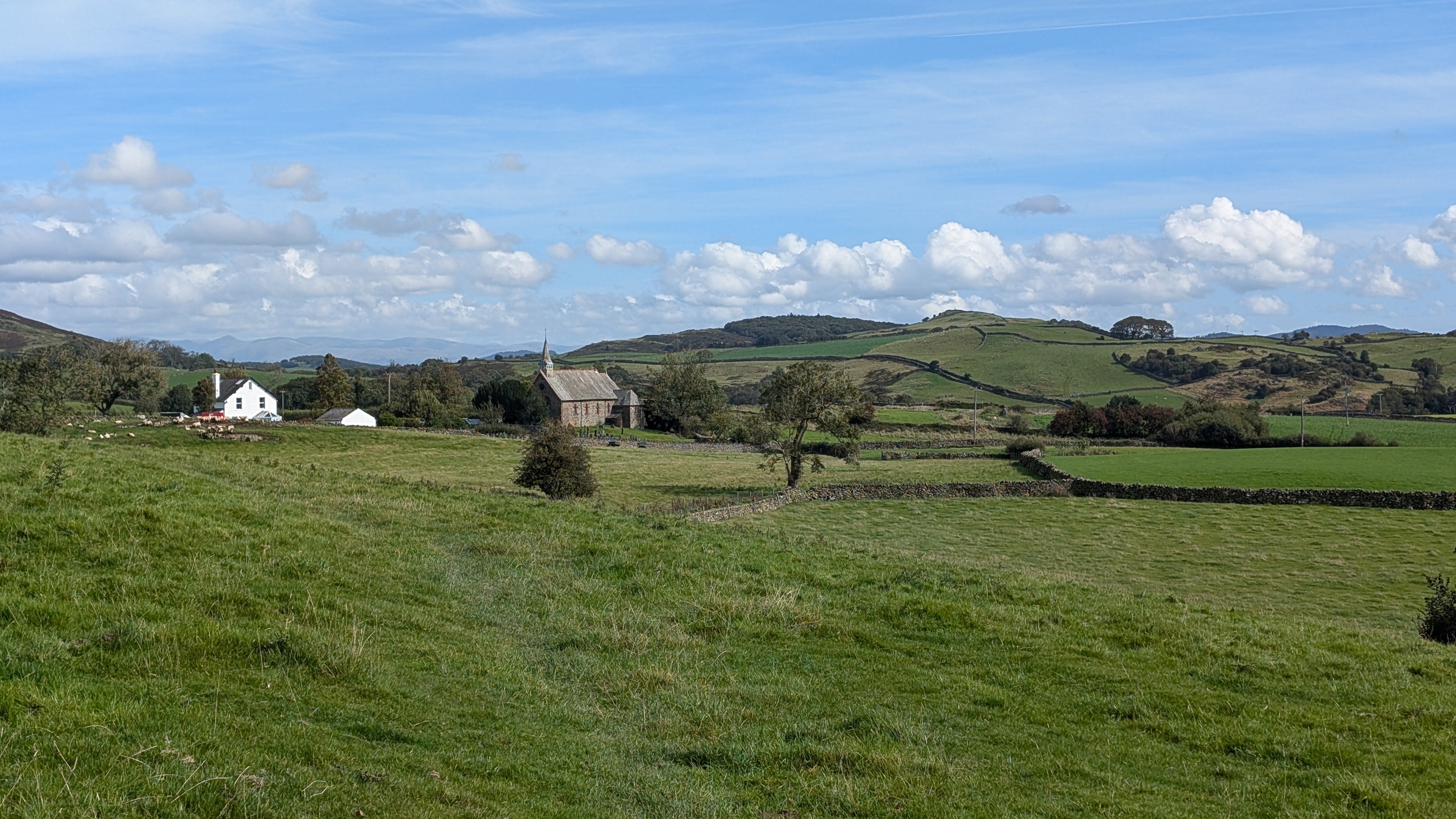 The route includes a range of landscapes from dramatic fells and lakes to farmland and villages