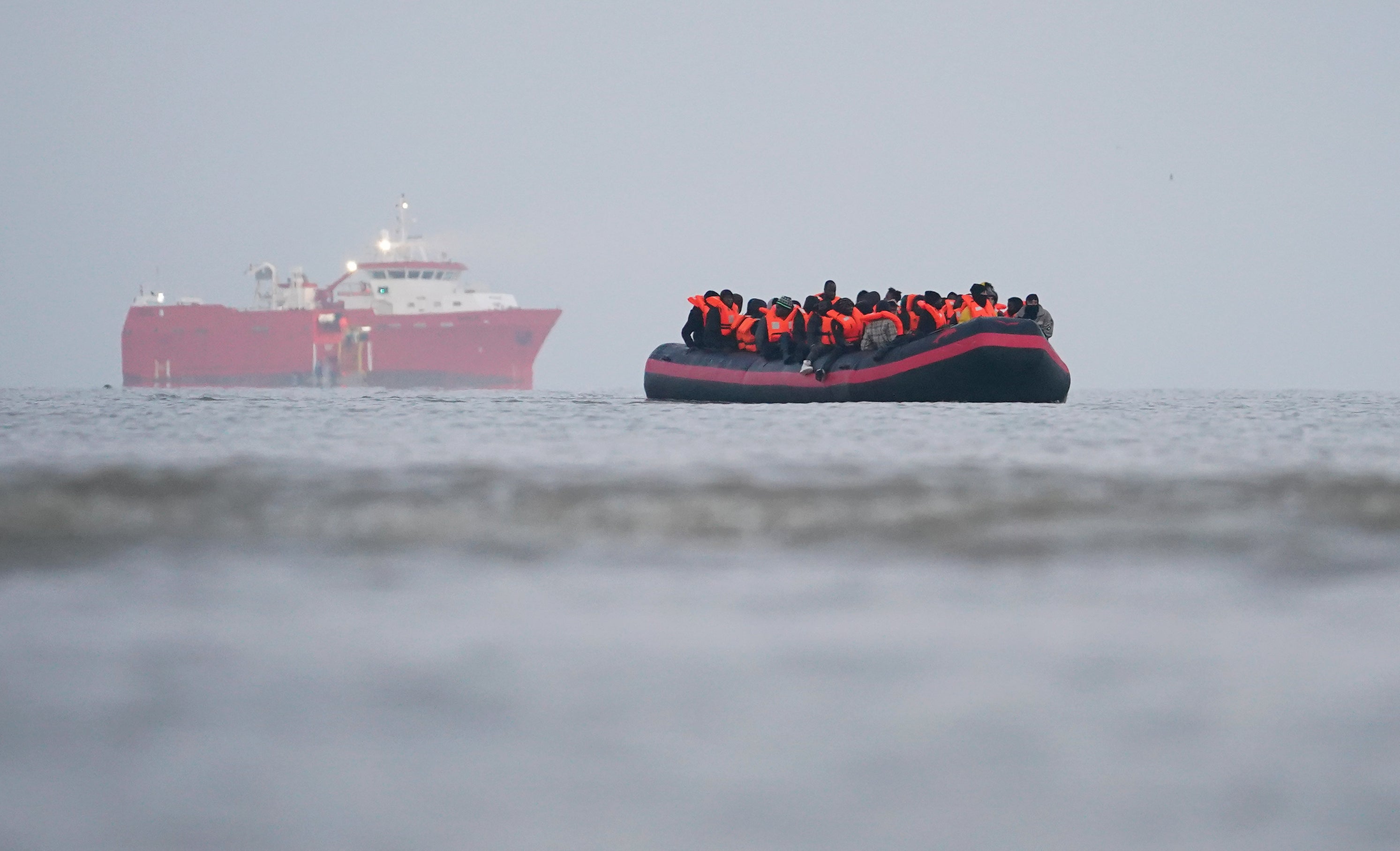 People thought to be migrants on board a small boat in Gravelines, France