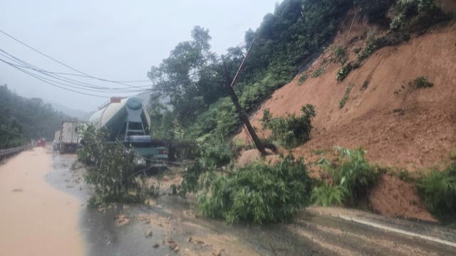<p>Landslides block the road on Khanh Le pass, near the location where a passenger bus was buried by a landslide in Khanh Hoa, Vietnam, Monday, Nov. 17, 2025. (Dang Tuan/VNA via AP)</p>