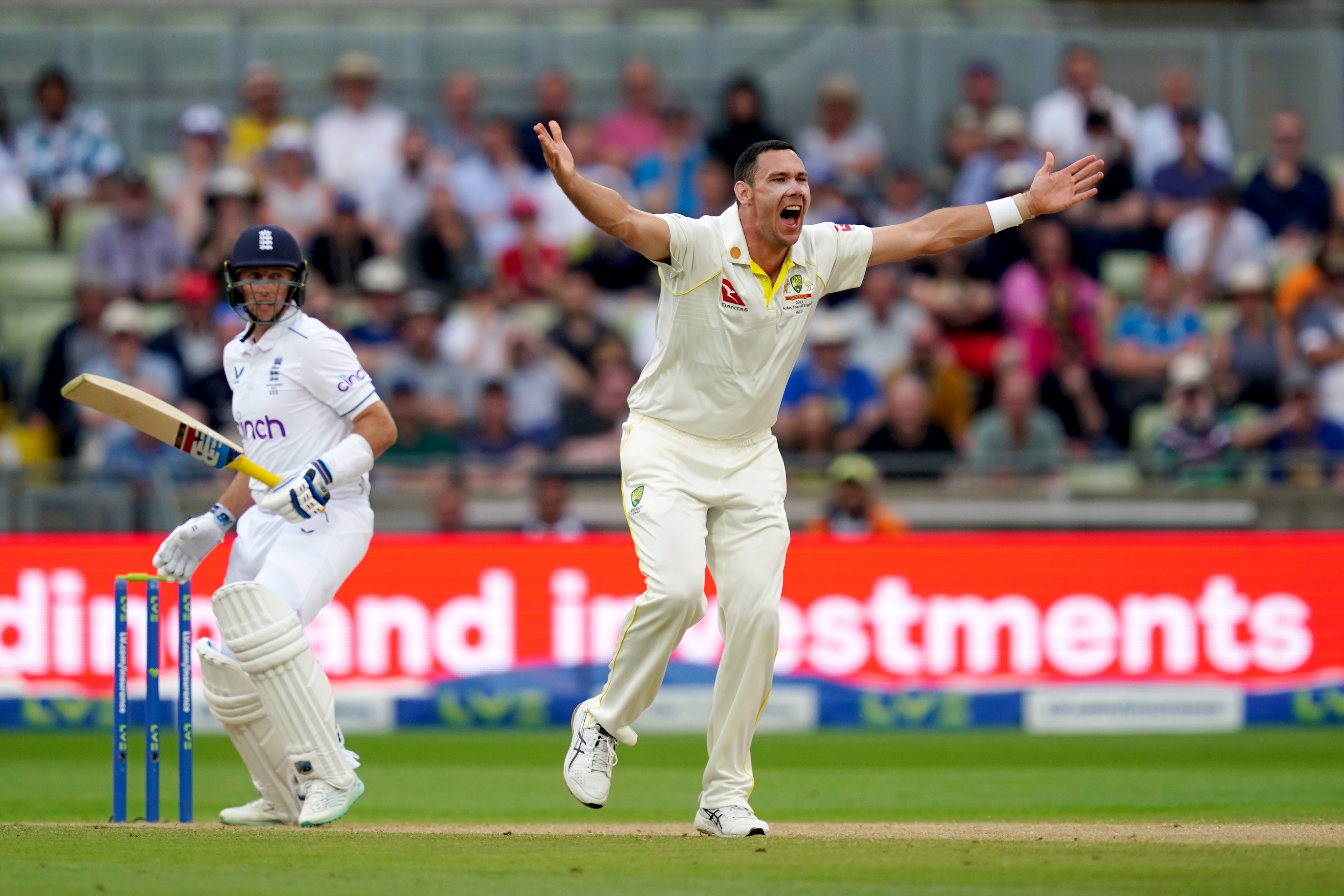 Scott Boland (right) appeals against Joe Root in 2023 (David Davies/PA)