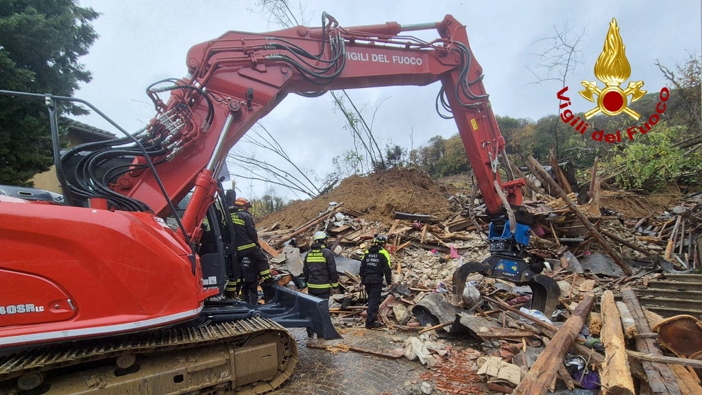 Two people have died in northern Italy after a mudslide cascaded through a town