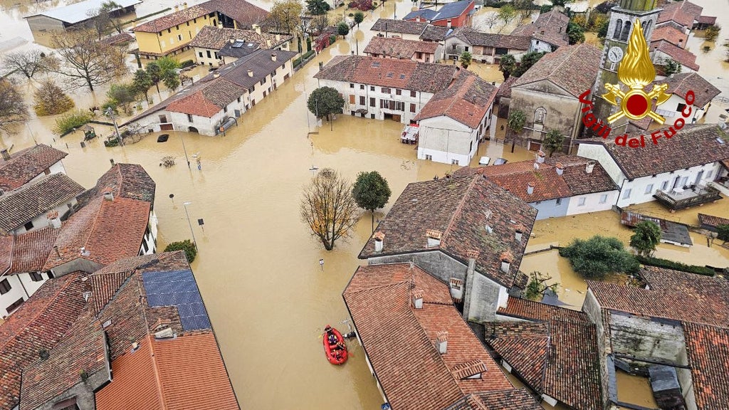 Two people have died in northern Italy after a mudslide cascaded through a town