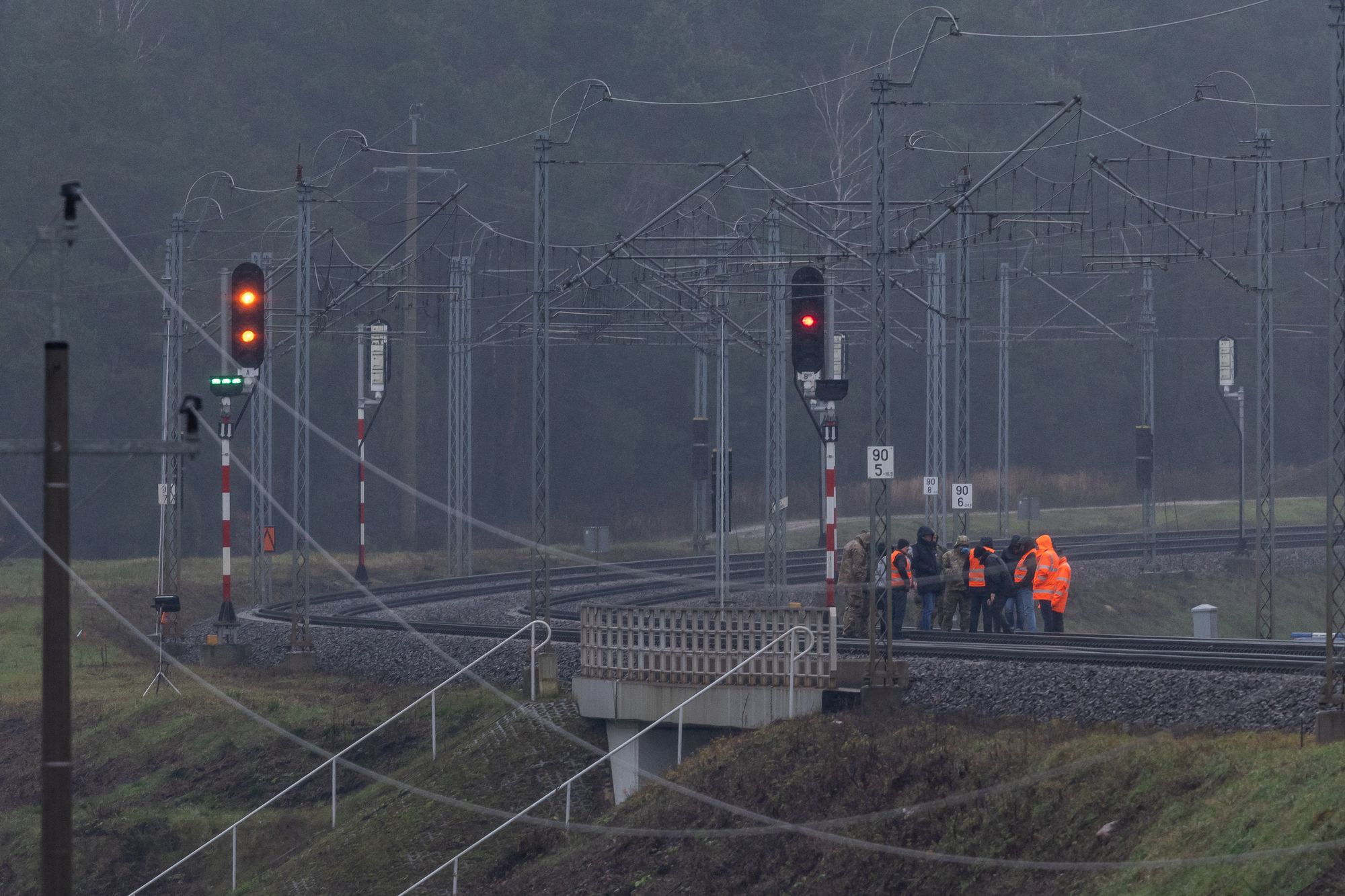 Investigators examine the railways damaged in an explosion on the rail line in Mika, next to Garwolin, central Poland on November 17, 2025, after the line presumably was targeted in a sabotage act.