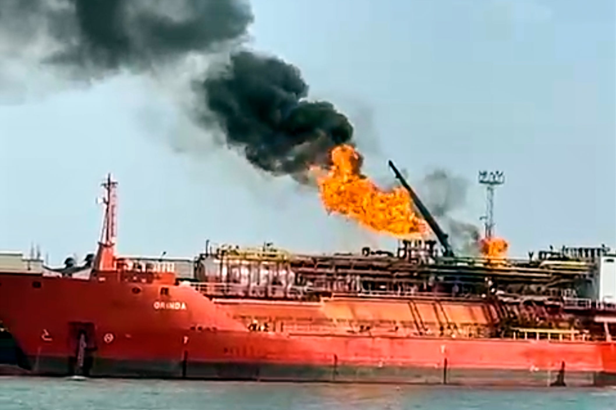 This image released on 17 November 2025 by Romania's Emergency services, ISU, shot from the Romanian side of the border on the Danube river, shows a cargo ship loaded with liquified petroleum gas engulfed by flames following Russian strikes on Ukrainian port infrastructure in Izmail, Ukraine