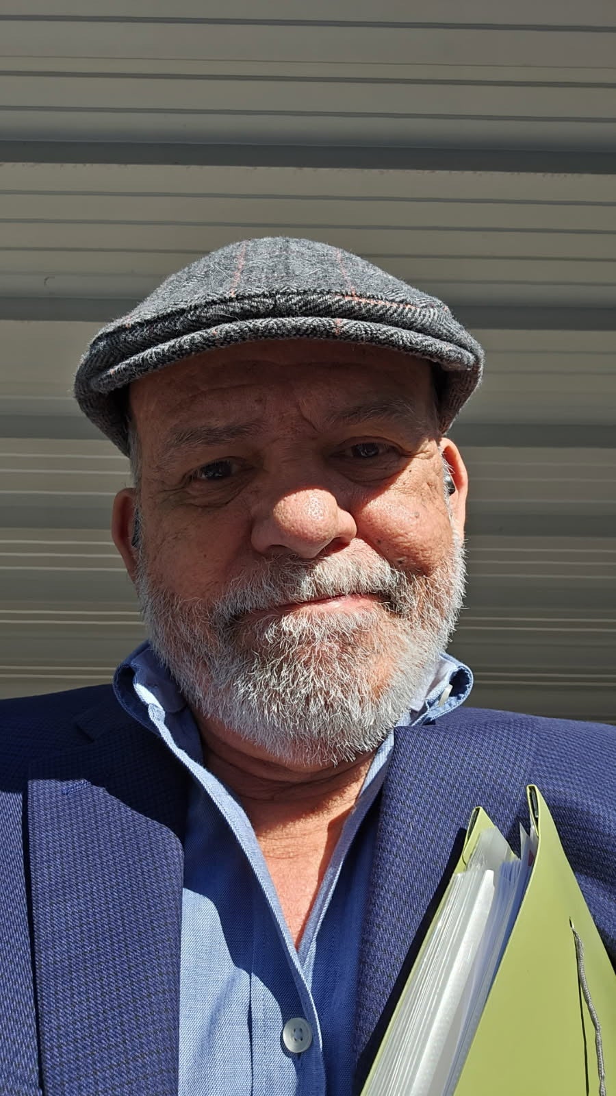 Páez pictured with a folder full of documents ahead of his October 31 meeting with ICE officials