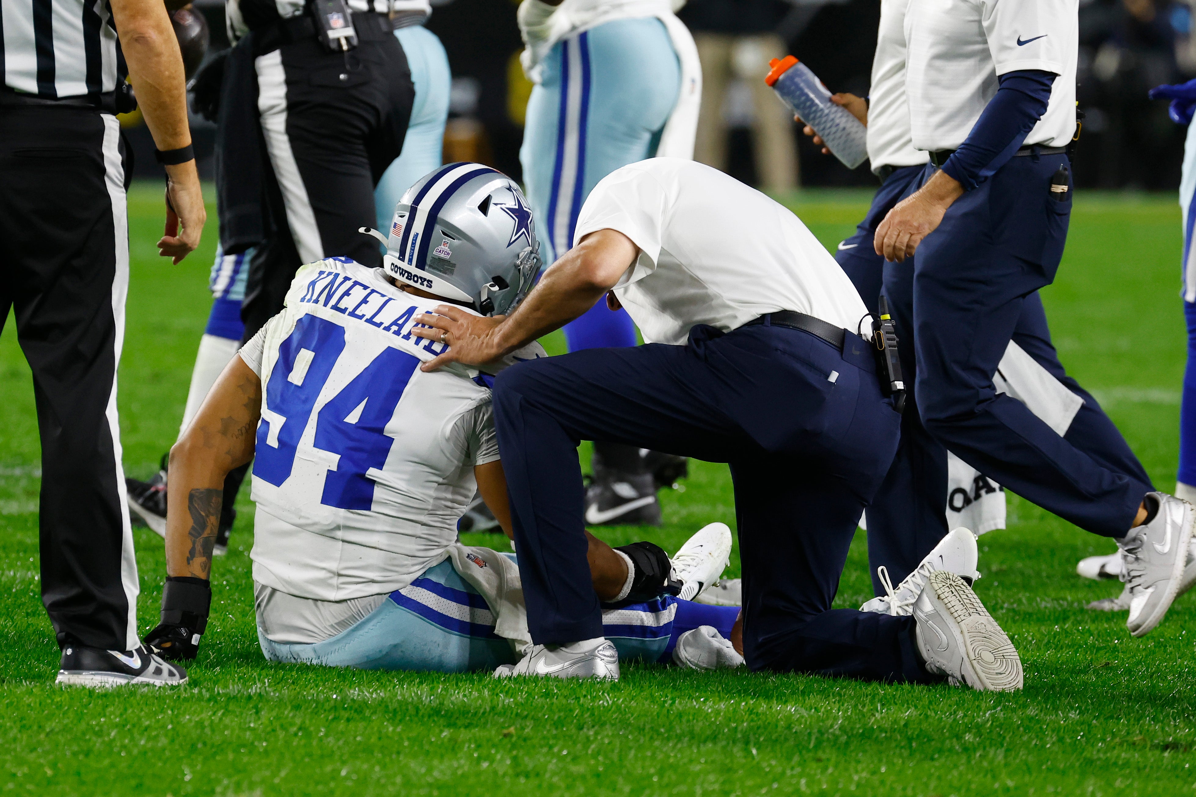 Marshawn Kneeland #94 of the Dallas Cowboys is on the field with an injury during the first quarter against the Pittsburgh Steelers at Acrisure Stadium on October 06, 2024 in Pittsburgh, Pennsylvania