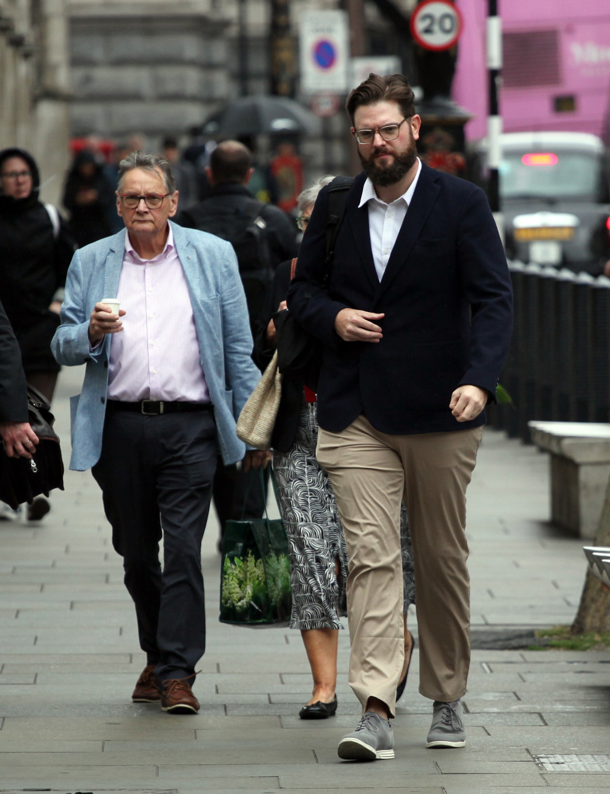 Ben Chiswick (R) and father Brent Chiswick (L) outside Central London County Court