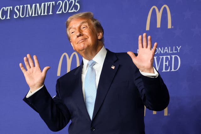 <p>Donald Trump gestures at the McDonald's Impact Summit in Washington on November 17</p>