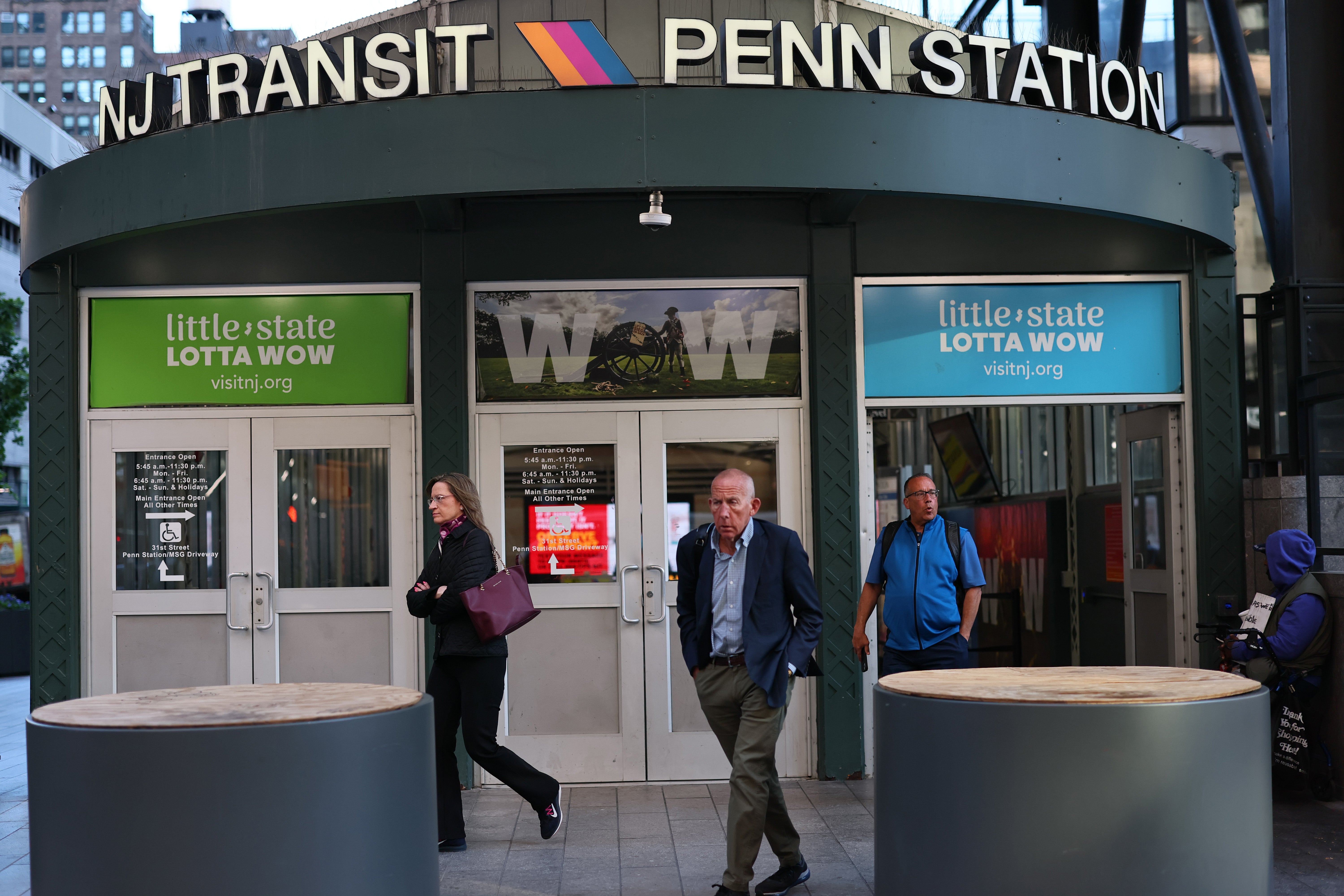 People exit the NJ Transit section of Penn Station on May 20, 2025 in New York City