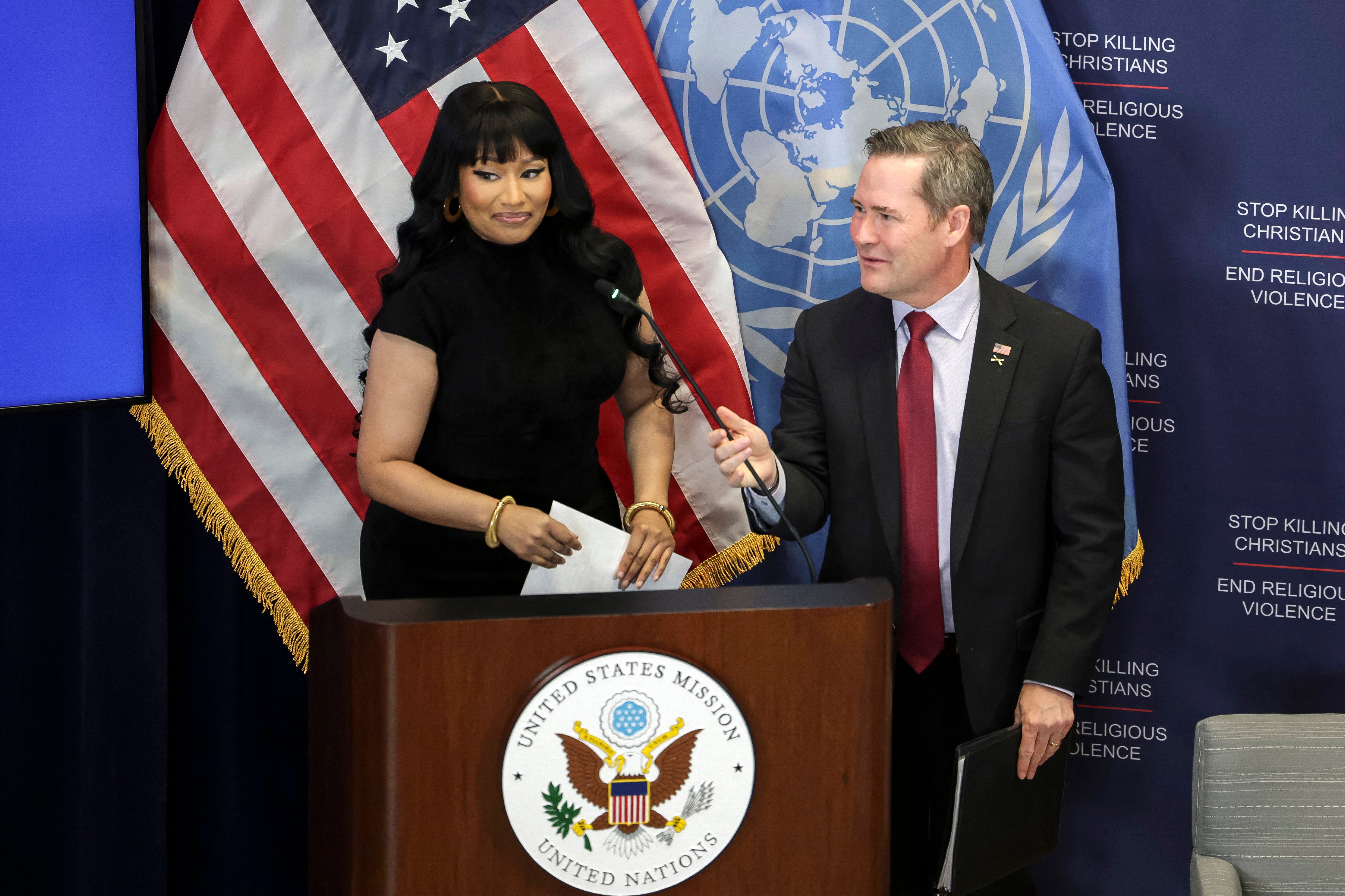 Minaj on stage with U.S. Ambassador Mike Waltz at the UN event