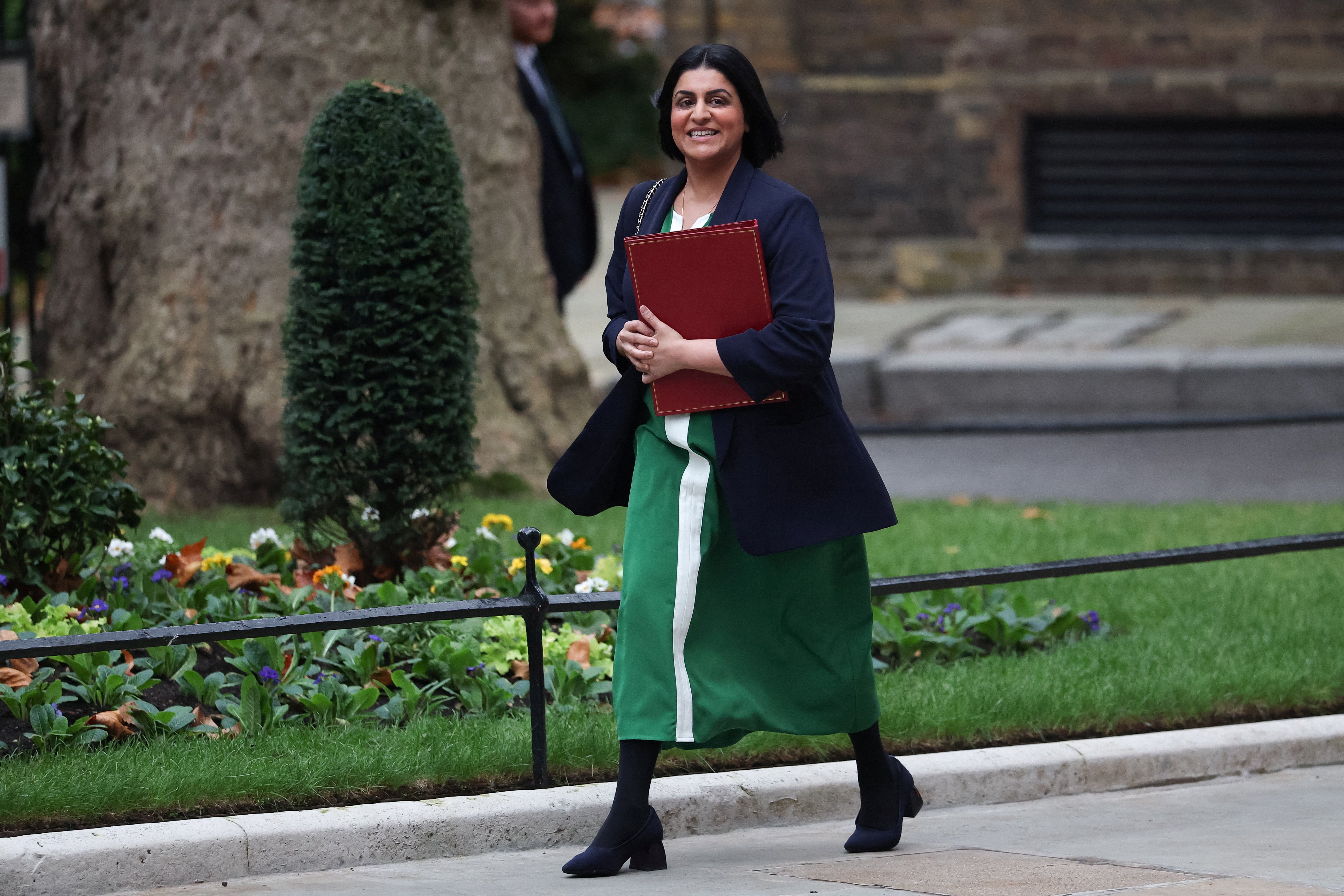 British Home Secretary Shabana Mahmood walks outside Downing Street, in London, Britain, November 18, 2025
