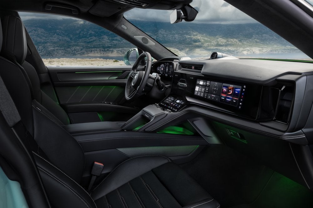 The Porsche Cayenne Electric Interior features the latest tech including wide OLED screens