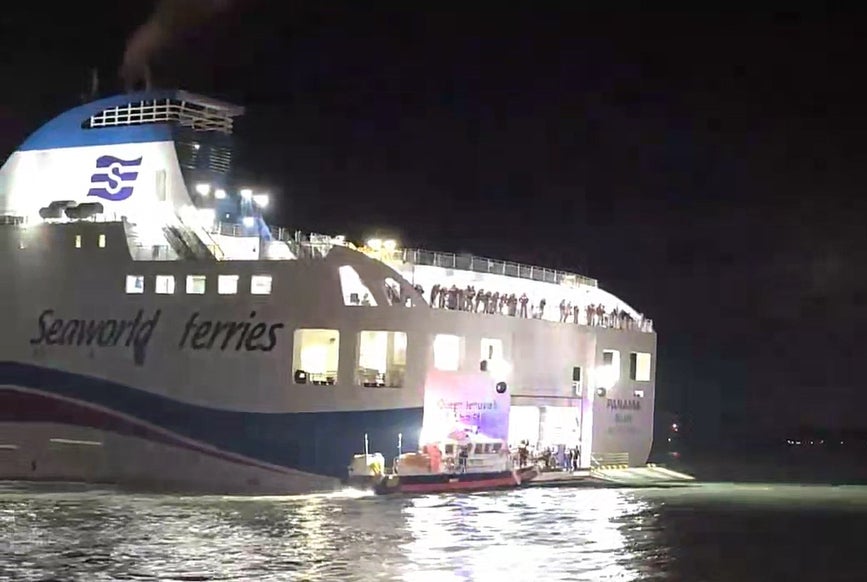 <p>Rescue workers assist the ferry’s passengers and crew on 19 November 2025</p>