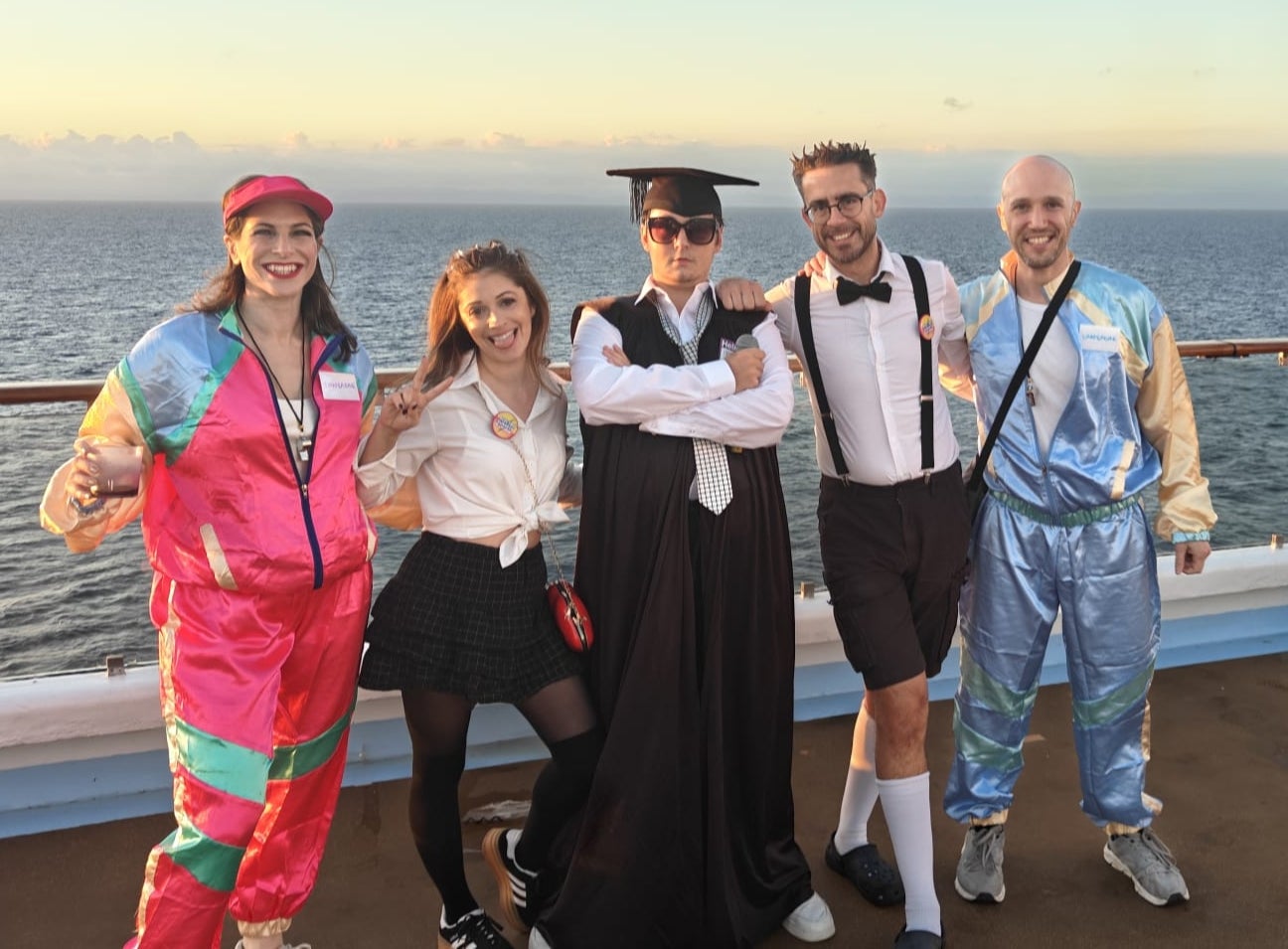 Marc and Danielle got into the ‘back to school’ vibes while their friends Sarah and Anthony dressed as PE teachers to pose with a very young ship headmaster