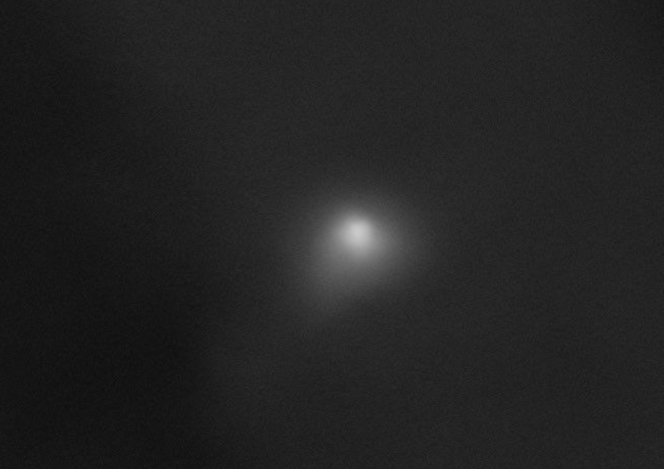 The High Resolution Imaging Science Experiment (HiRISE) camera aboard NASA's Mars Reconnaissance Orbiter captured this image of interstellar comet 3l/ATLAS on Oct. 2, 2025. At the time it was imaged, the comet was about 0.2 astronomical units (19 million miles, or 30 million kilometers) from the spacecraft