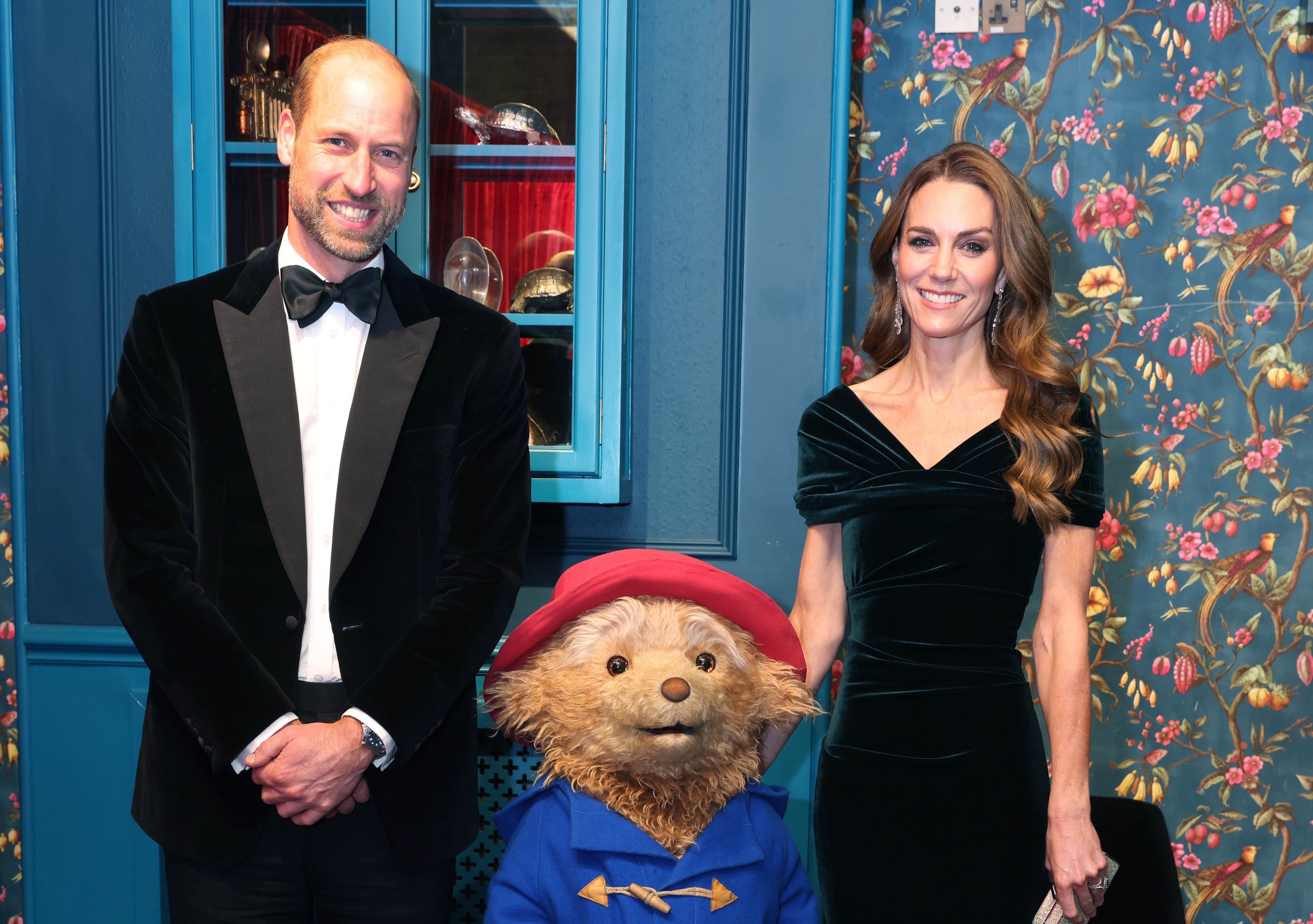 The Prince and Princess of Wales pose for a photo with the Paddington Bear from the London stage musical, at the Royal Variety Performance at the Royal Albert Hall