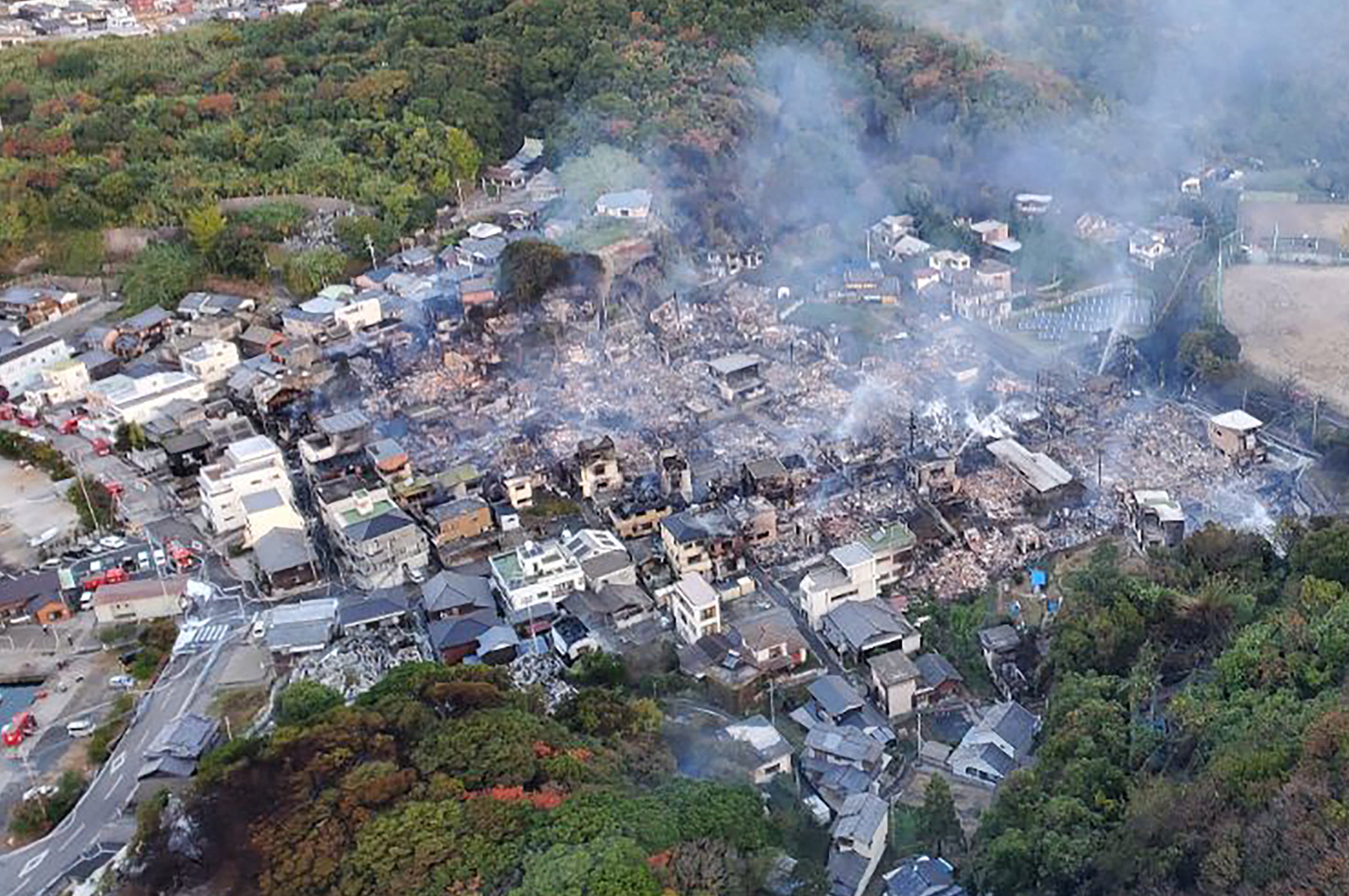 Aerial view of the scene after an overnight fire in the Saganoseki area of Oita city, Japan, on 19 November 2025
