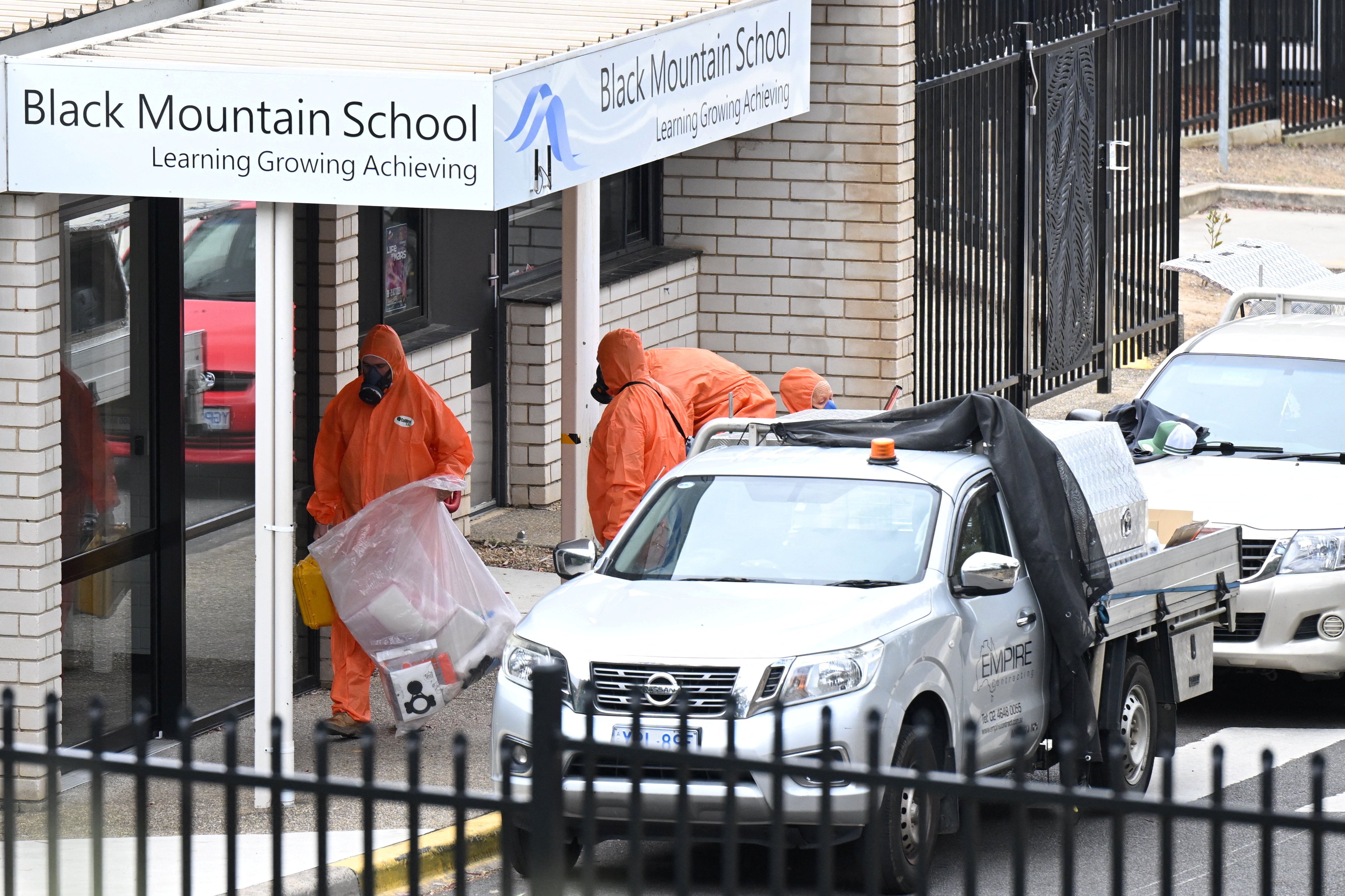 Accredited asbestos removalists attend to Black Mountain School in Canberra on 17 November 2025