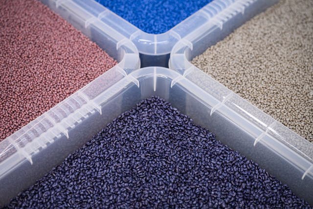 <p>Tubs of finished plastic pellets from differing production techniques</p>