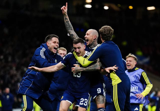 <p>Scotland’s Kenny McLean celebrates his goal from the halfway line as the Tartan Army reached their first men's World Cup in 27 years </p>