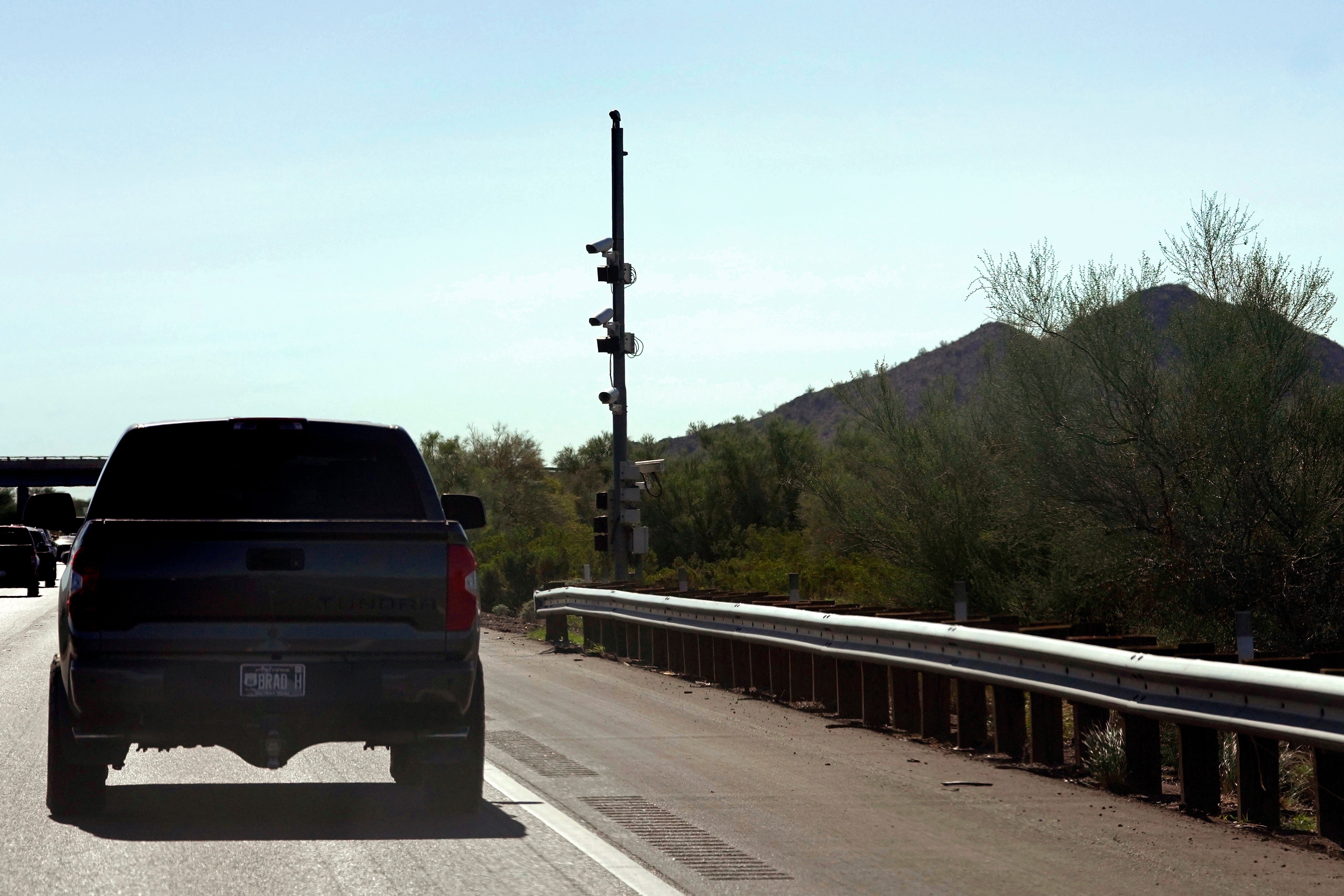 A license plate reader used by U.S. Border Patrol sits along Interstate 10, Tuesday, Oct. 21, 2025, in Sacaton, Ariz.