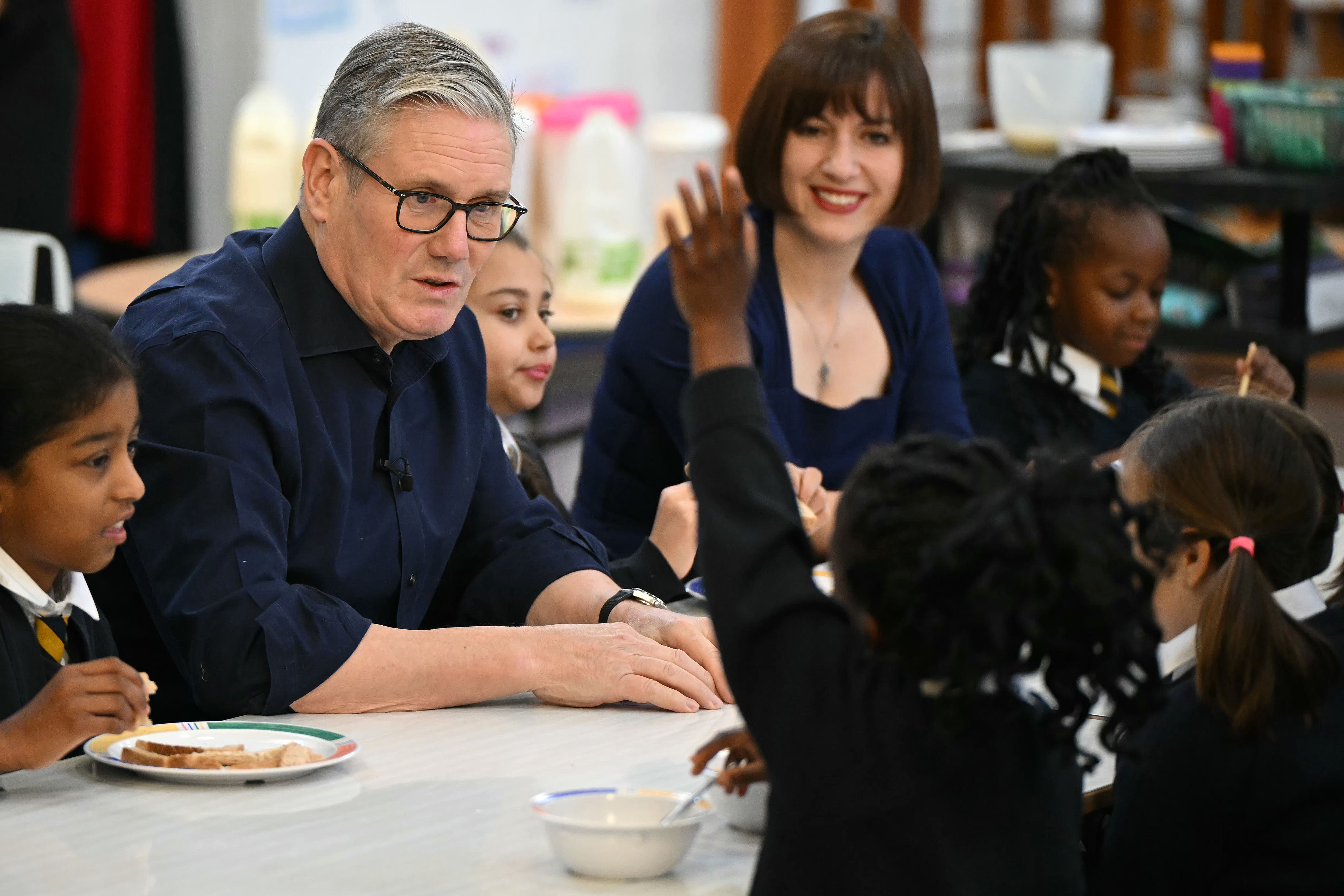 Sir Keir Starmer, left, was visiting a primary school breakfast club with Education Secretary Bridget Phillipson, right (Justin Tallis/PA)