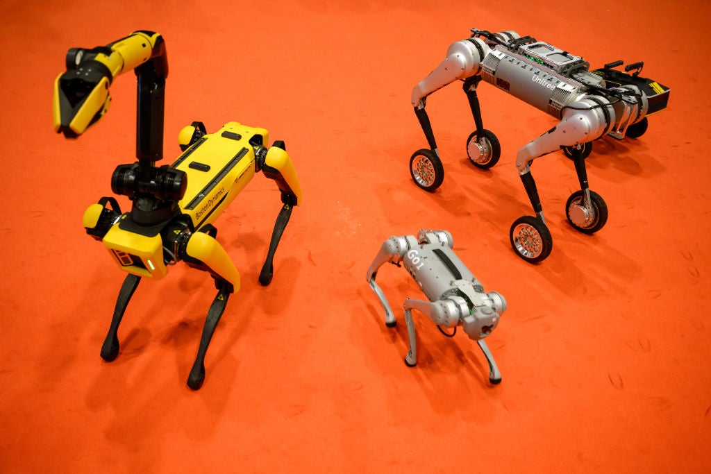 Robotic devices from Boston Dynamics and Unitree are seen at the International Conference on Robotics and Automation (ICRA) at ExCel on 30 May, 2023 in London, England