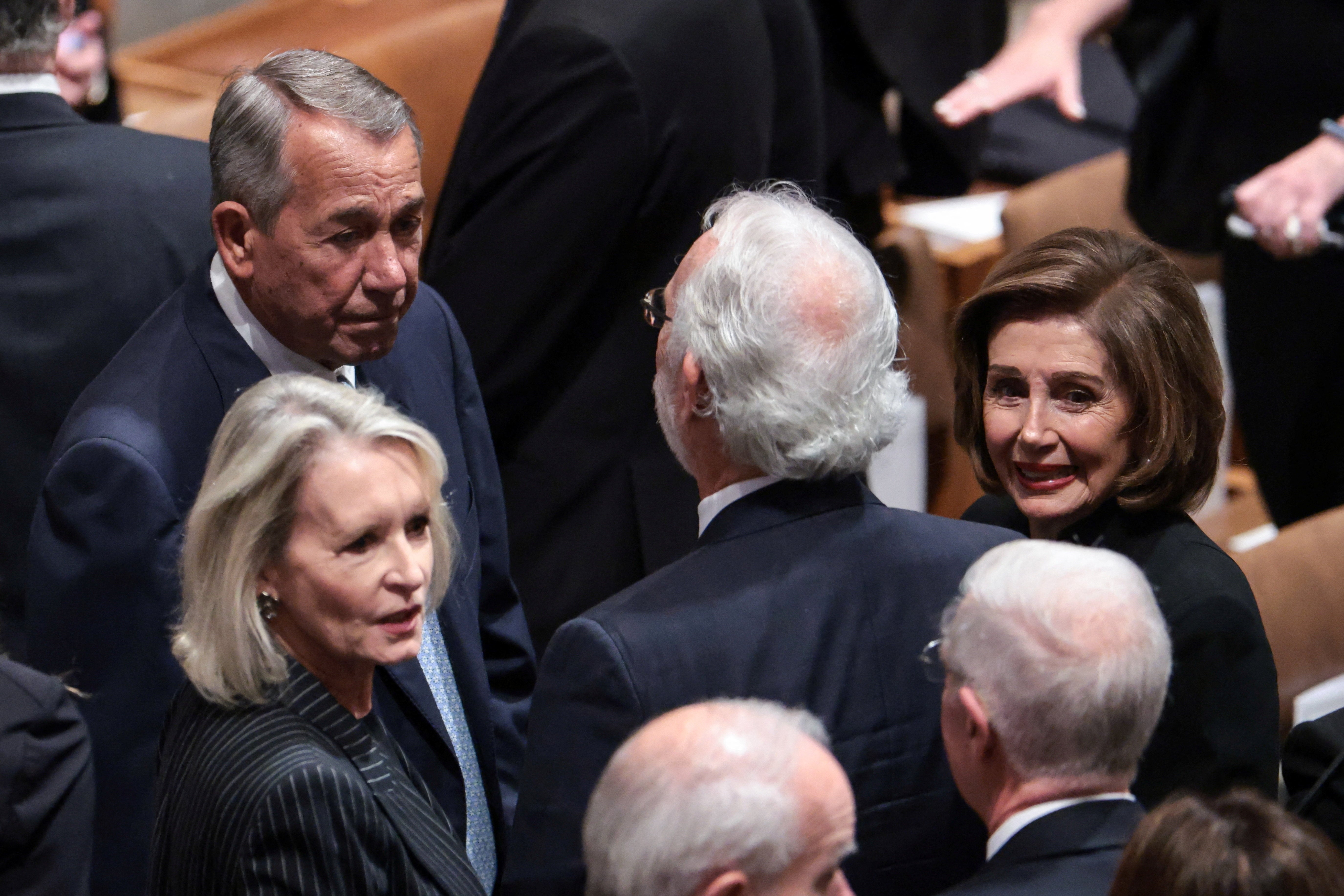 Two former House speakers – Republican John Boehner, left, and Democrat Nancy Pelosi, right – arrive for Cheney’s funeral