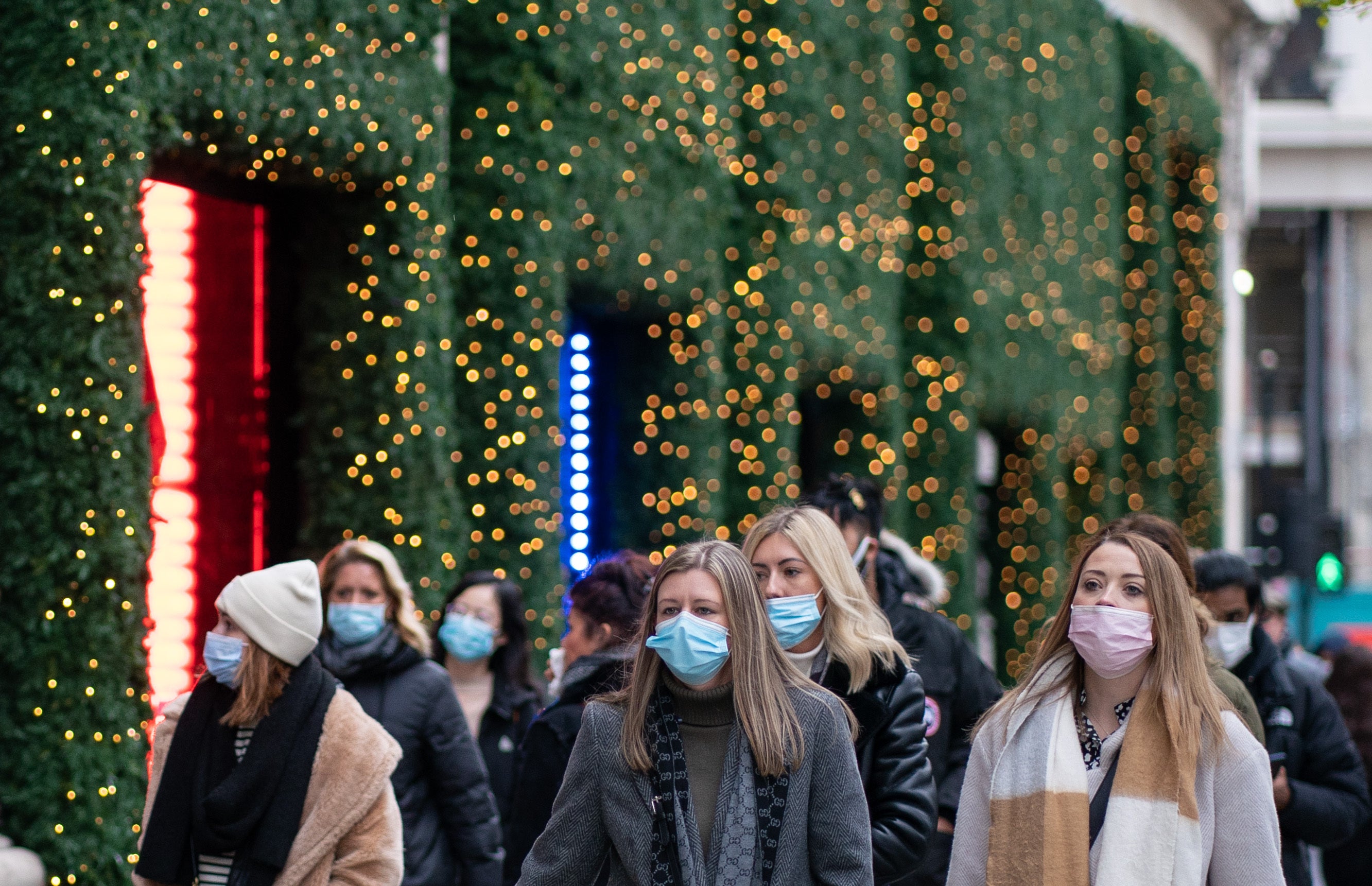 Britons have been warned to wear a face mask in the lead-up to Christmas if they feel ill