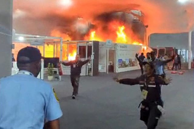 <p>Footage shows emergency crews battling a fire that broke out at a pavilion inside the venue of the Cop30 UN Climate Change Conference in Belem, Brazil, on Thursday</p>