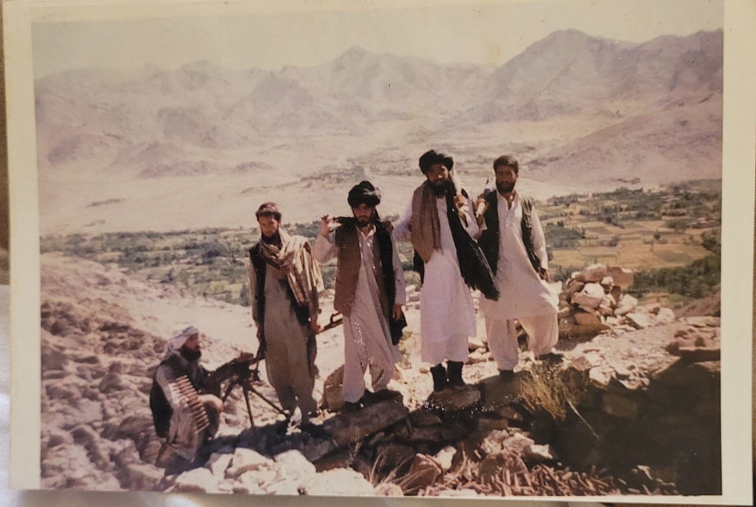 Maiwand Banayee, extreme right, with fellow Taliban fighters at Kharote village