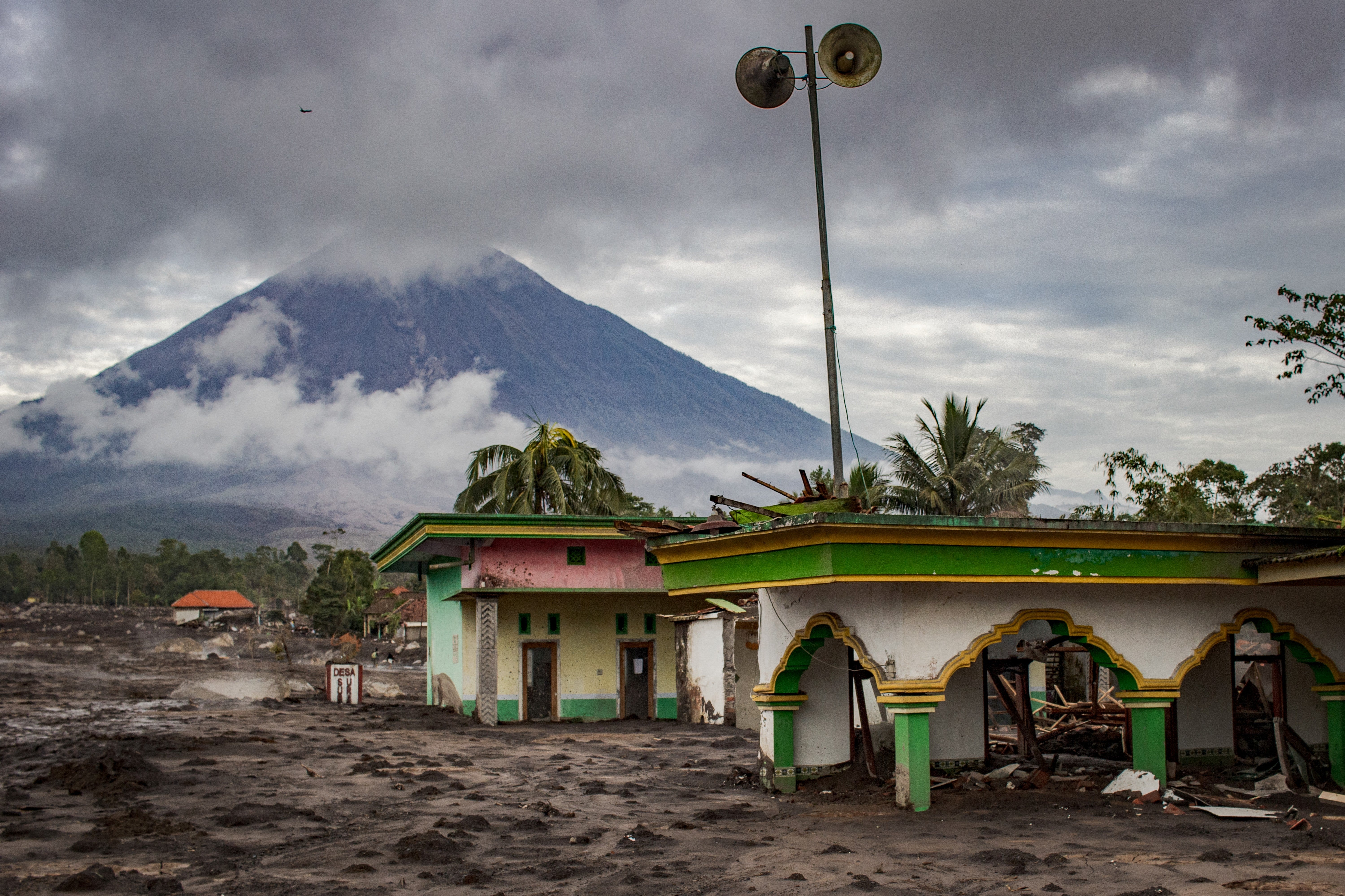Volcanic ash covers the ground after a pyroclastic flow during yesterday's eruption of Mount Semeru, in Supiturang village Lumajang, East Java on November 20, 2025. (Photo by Agus Harianto / AFP) (Photo by AGUS HARIANTO/AFP via Getty Images)